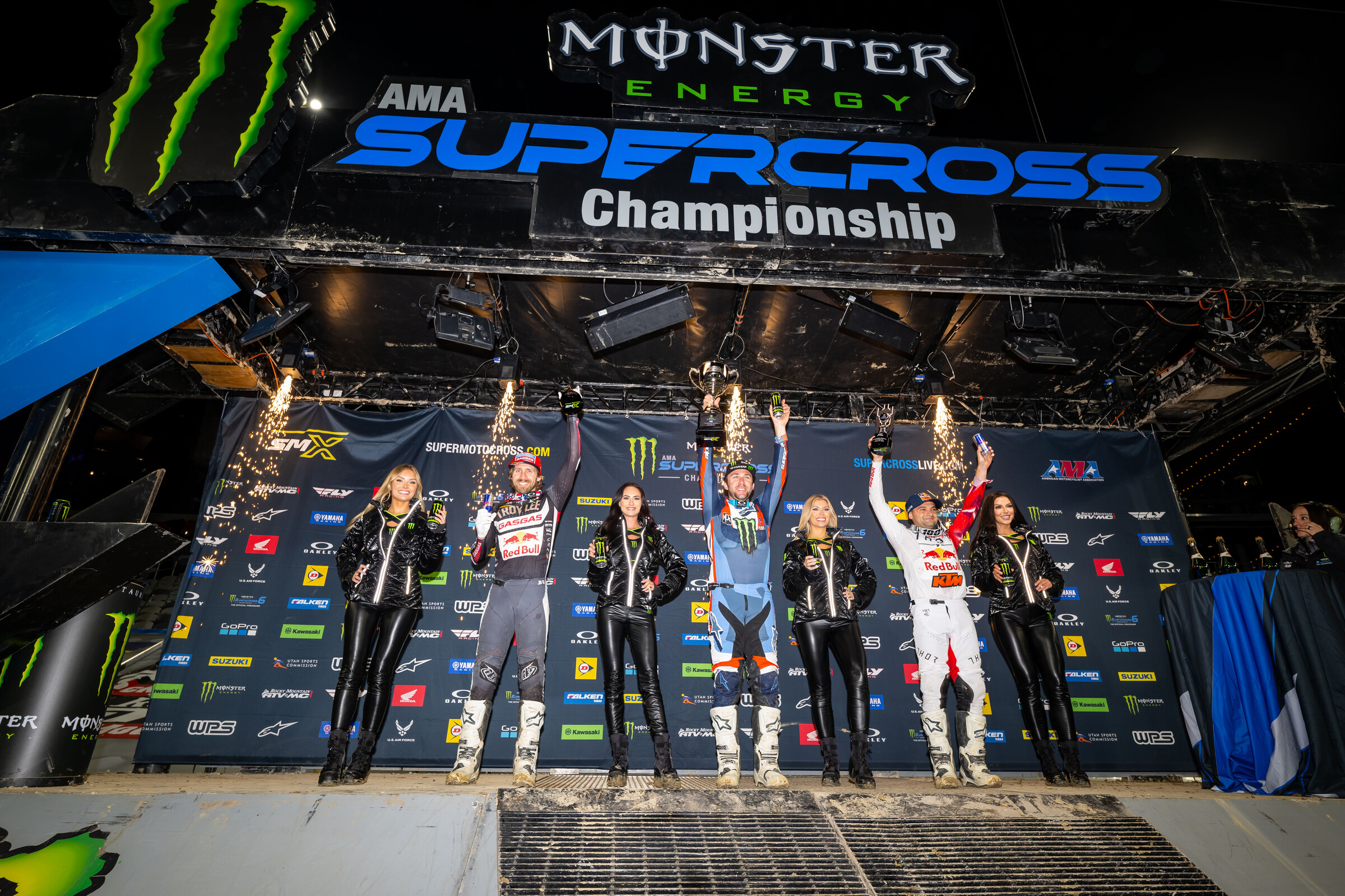 The 2023 San Diego Supercross 450SX main event podium: Eli Tomac (Yamaha), Cooper Webb (KTM), and Justin Barcia (GasGas).