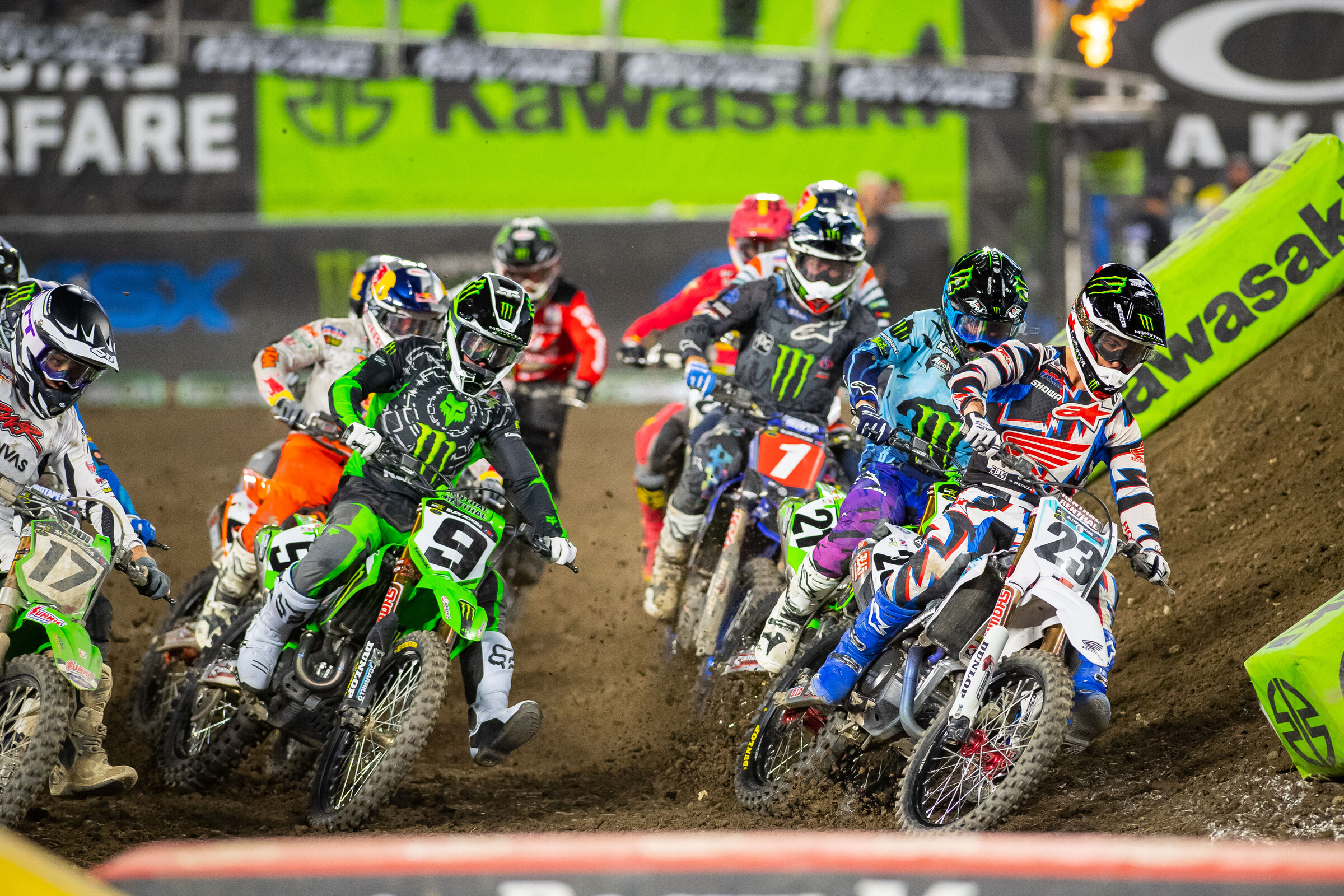 Chase Sexton leads the field into the first turn.