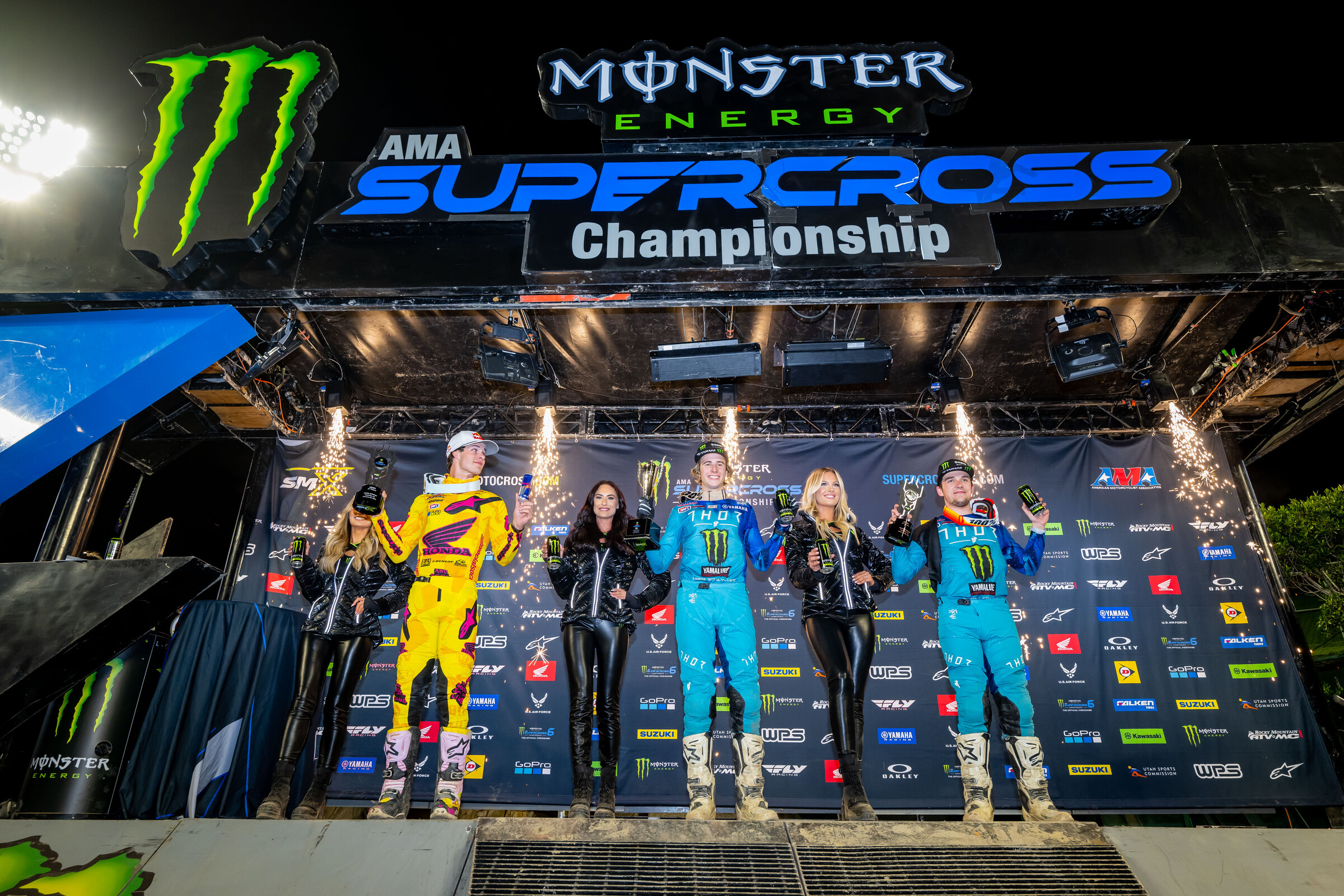 The 2023 Anaheim 2 Supercross 250SX overall podium: Levi Kitchen (Yamaha), Jett Lawrence (Honda), and Stilez Robertson (Yamaha).
