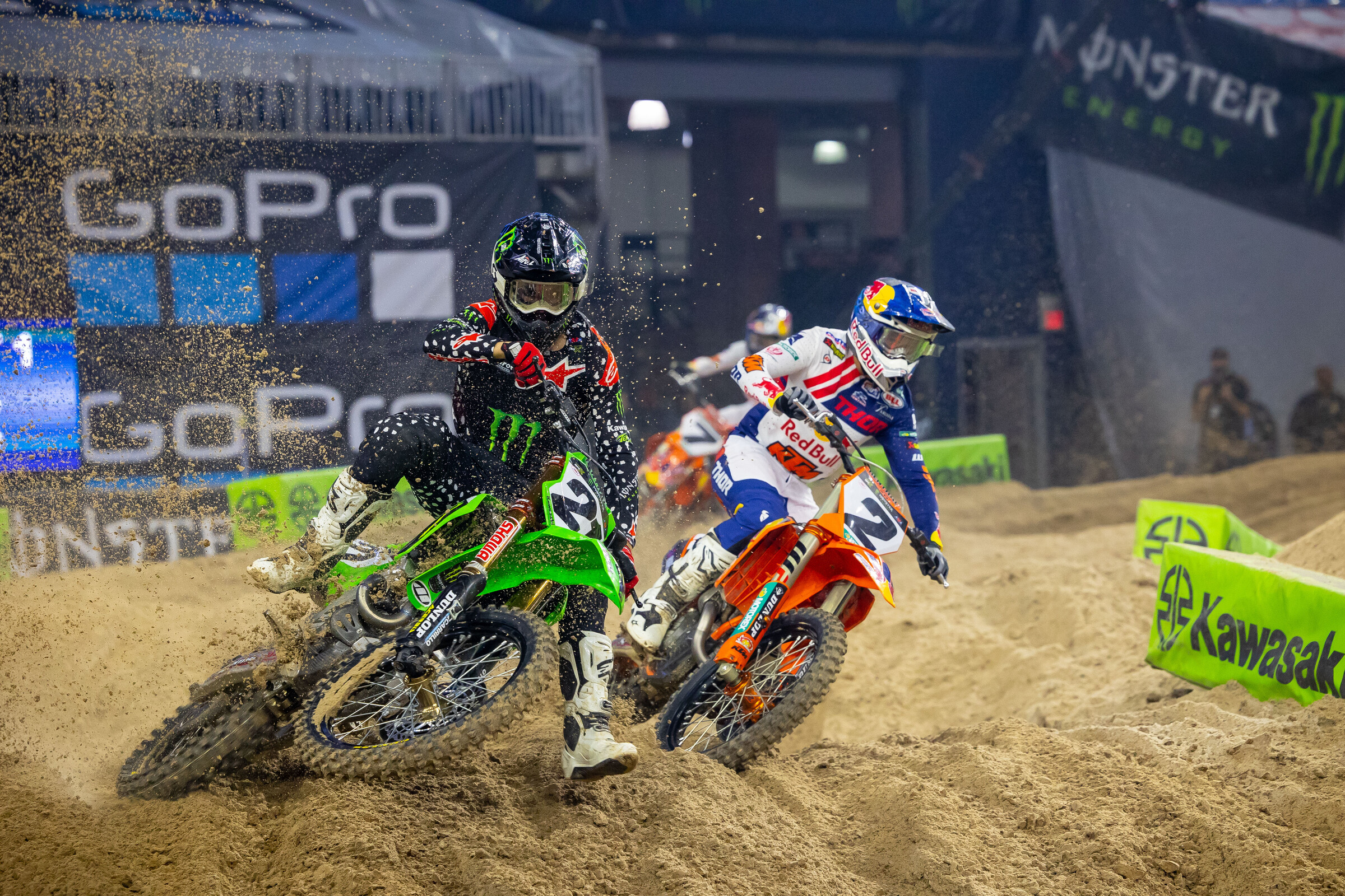 Jason Anderson battles Cooper Webb in the heat race at Houston.