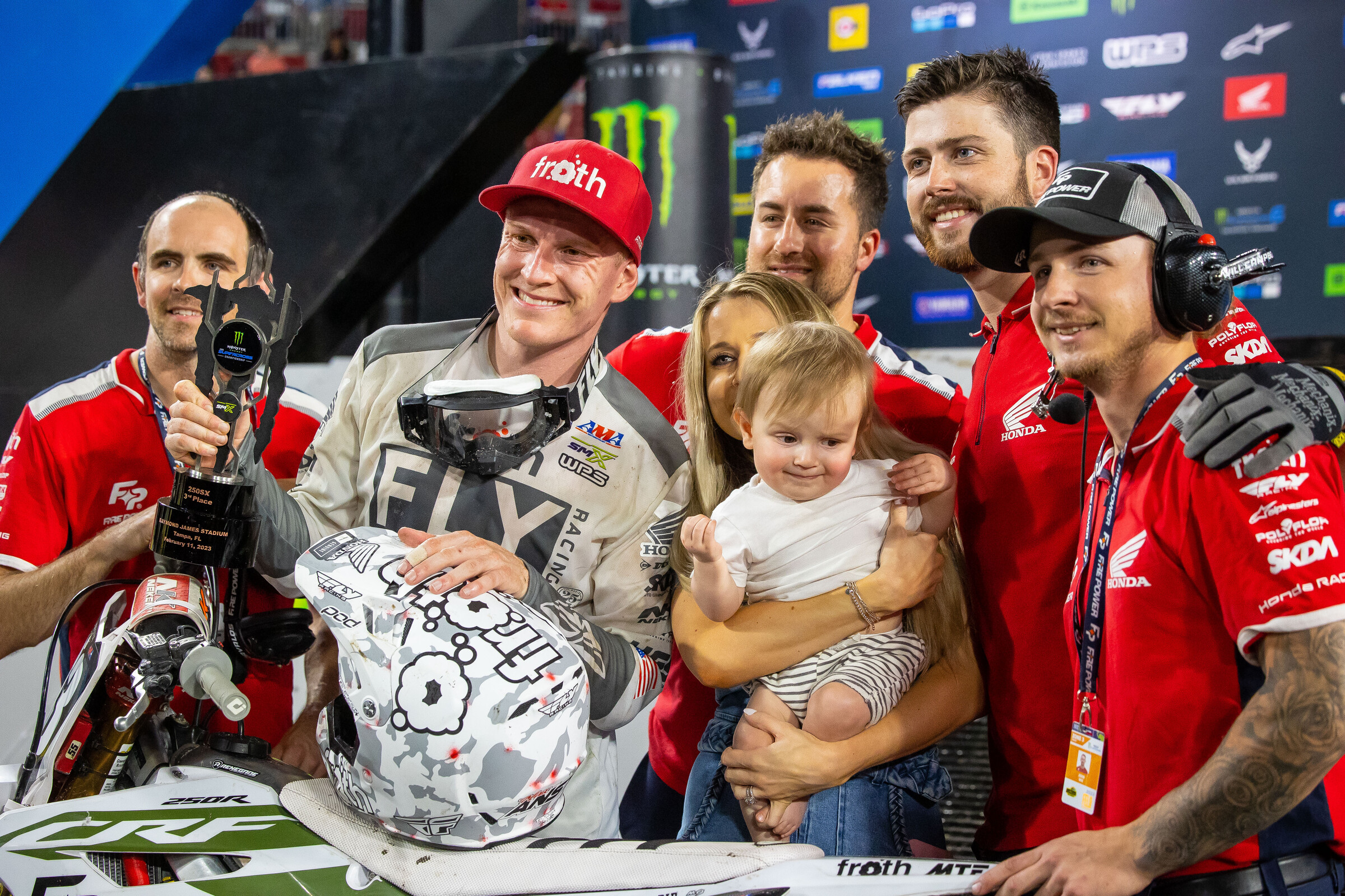 An excited Max Anstie celebrates another podium with his family and team. 