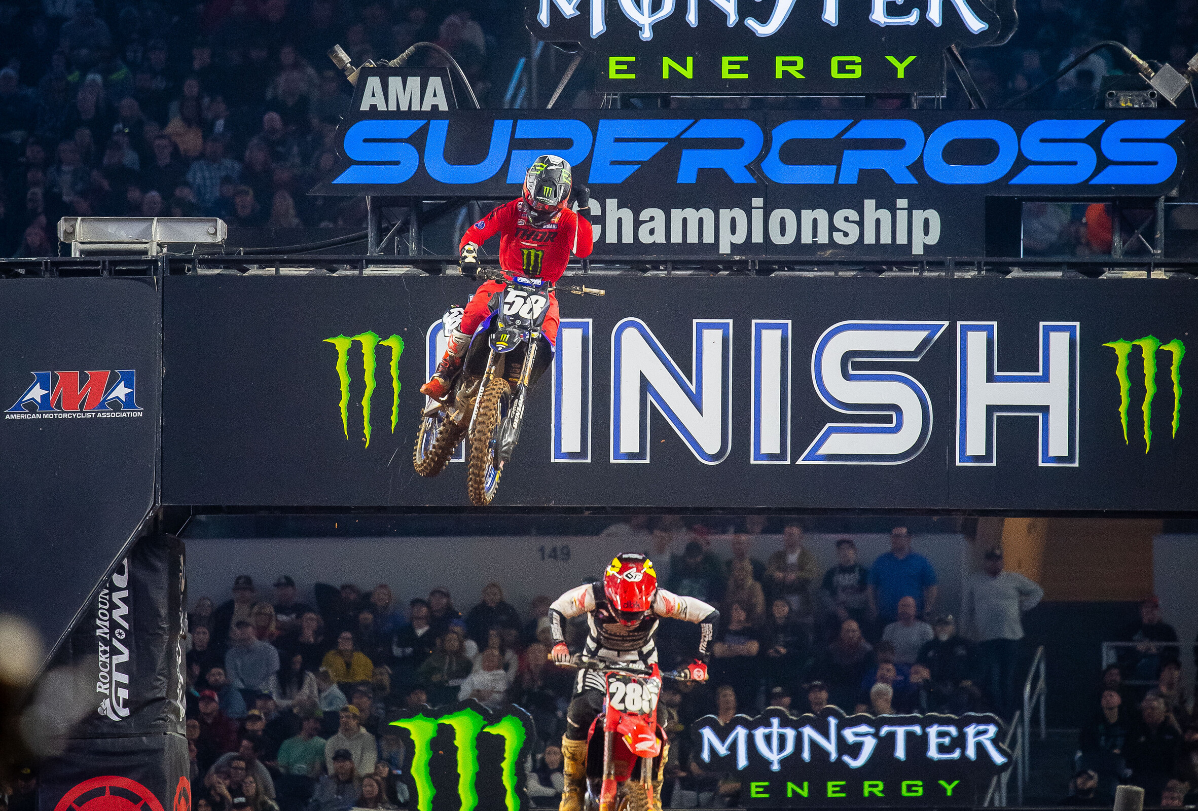 Jordon Smith pumps his fist while taking the win in 250SX Race 2.