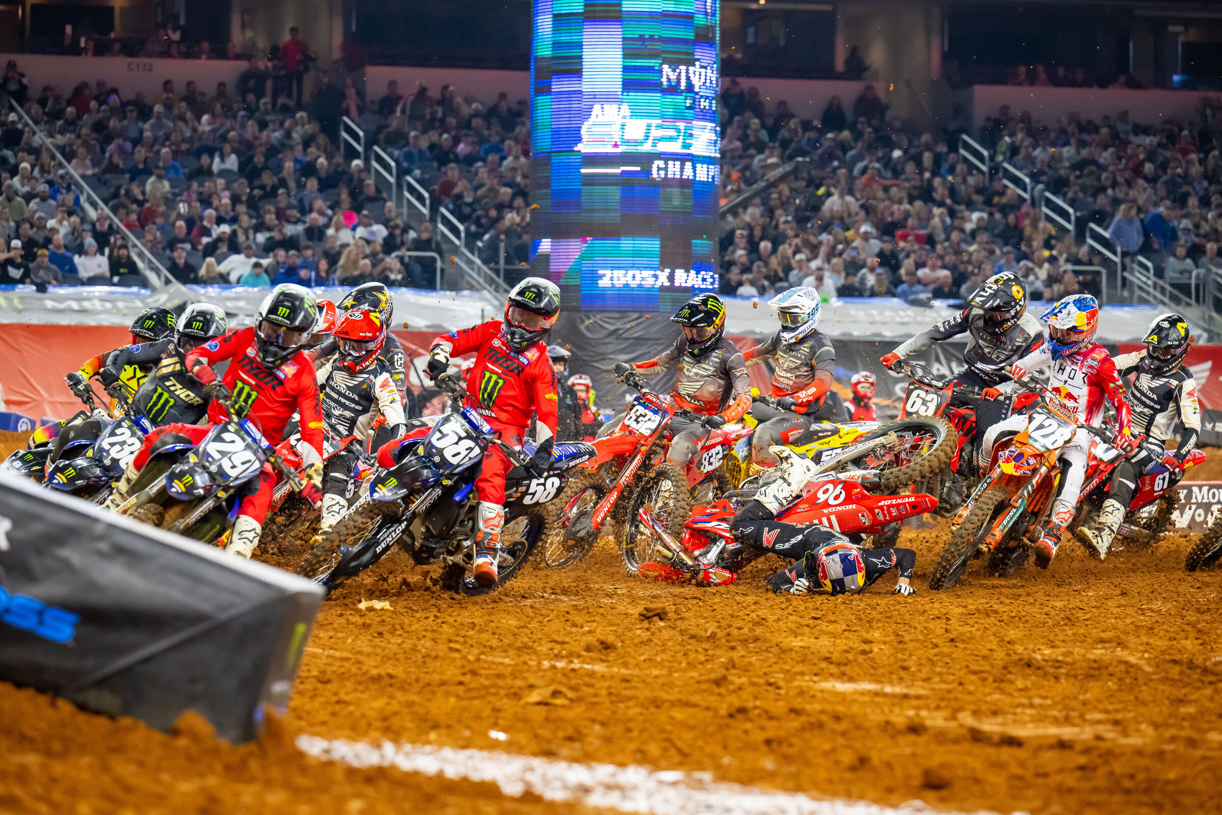 Hunter Lawrence takes a spill in the first turn of 250SX Race 3.