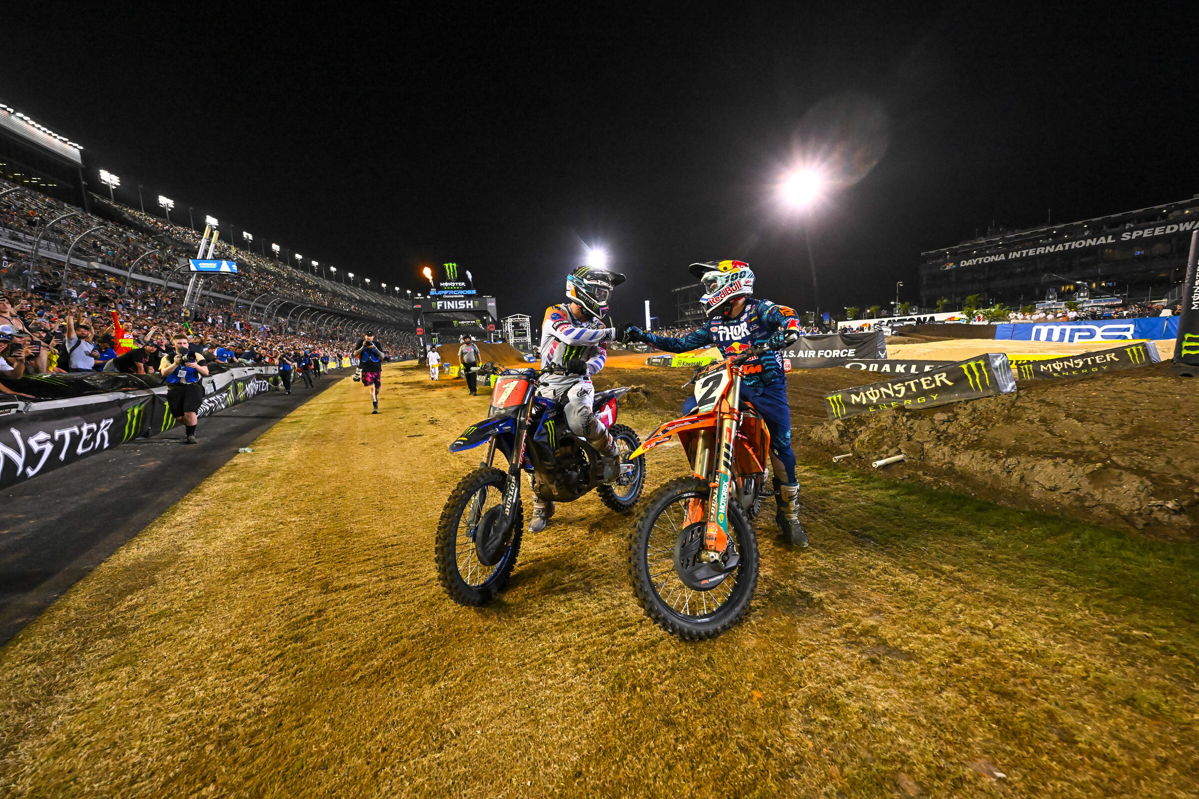 Eli Tomac and Cooper Webb share a fist pump after battling it out for the main event.