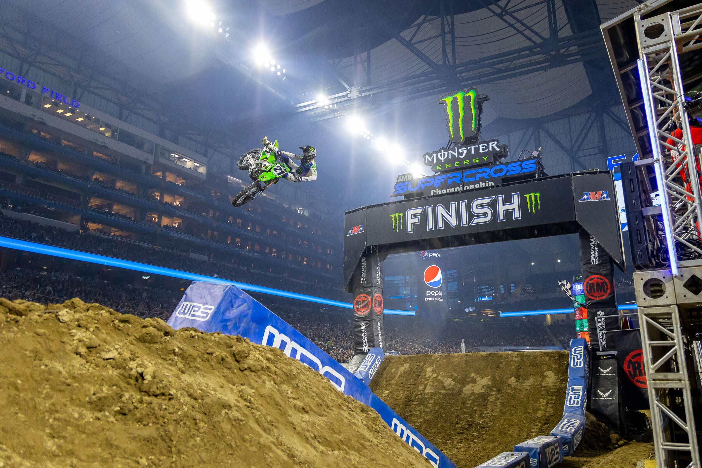 Jason Anderson celebrates a heat race win. 