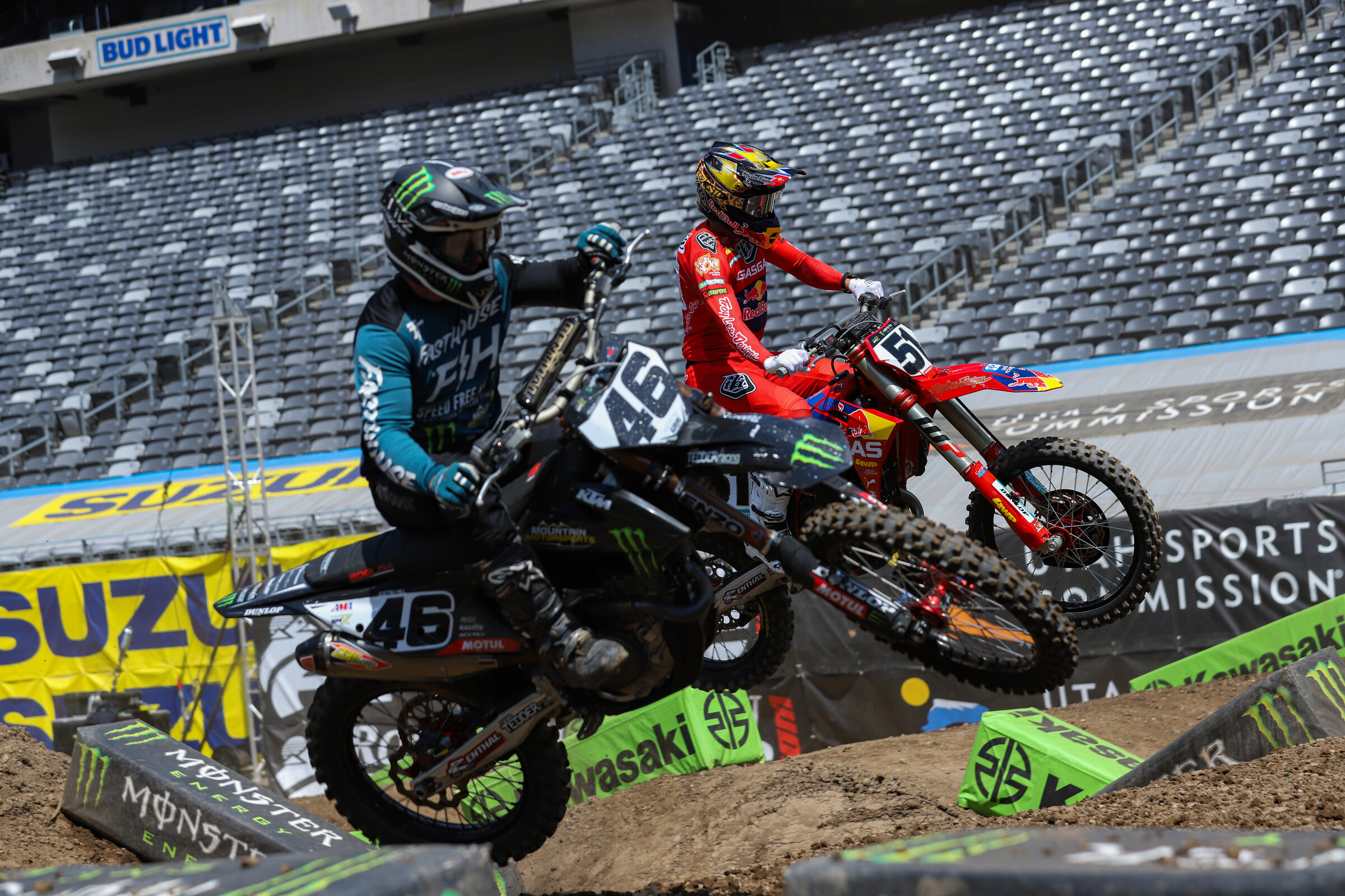 Justin Barcia goes outside in the elevated turn as Justin Hill goes inside.