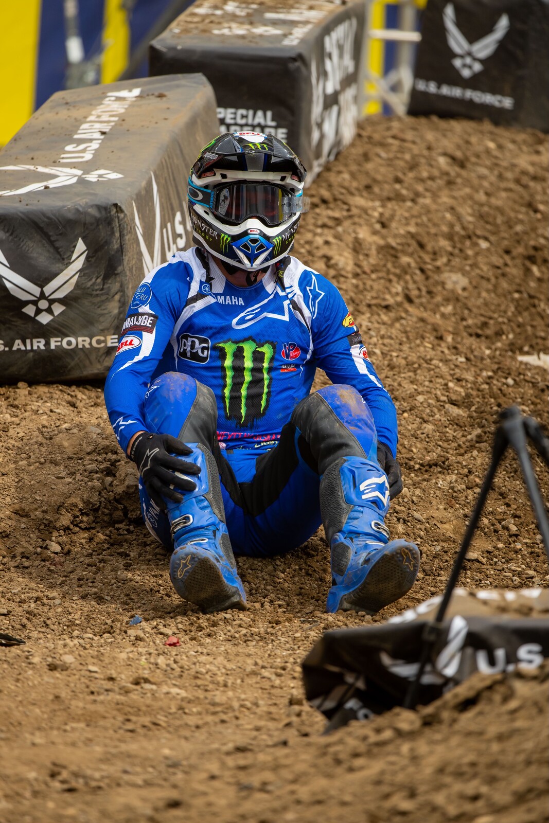 Eli Tomac sitting on the ground after a hard crash in the first 450SX group A qualifying session.