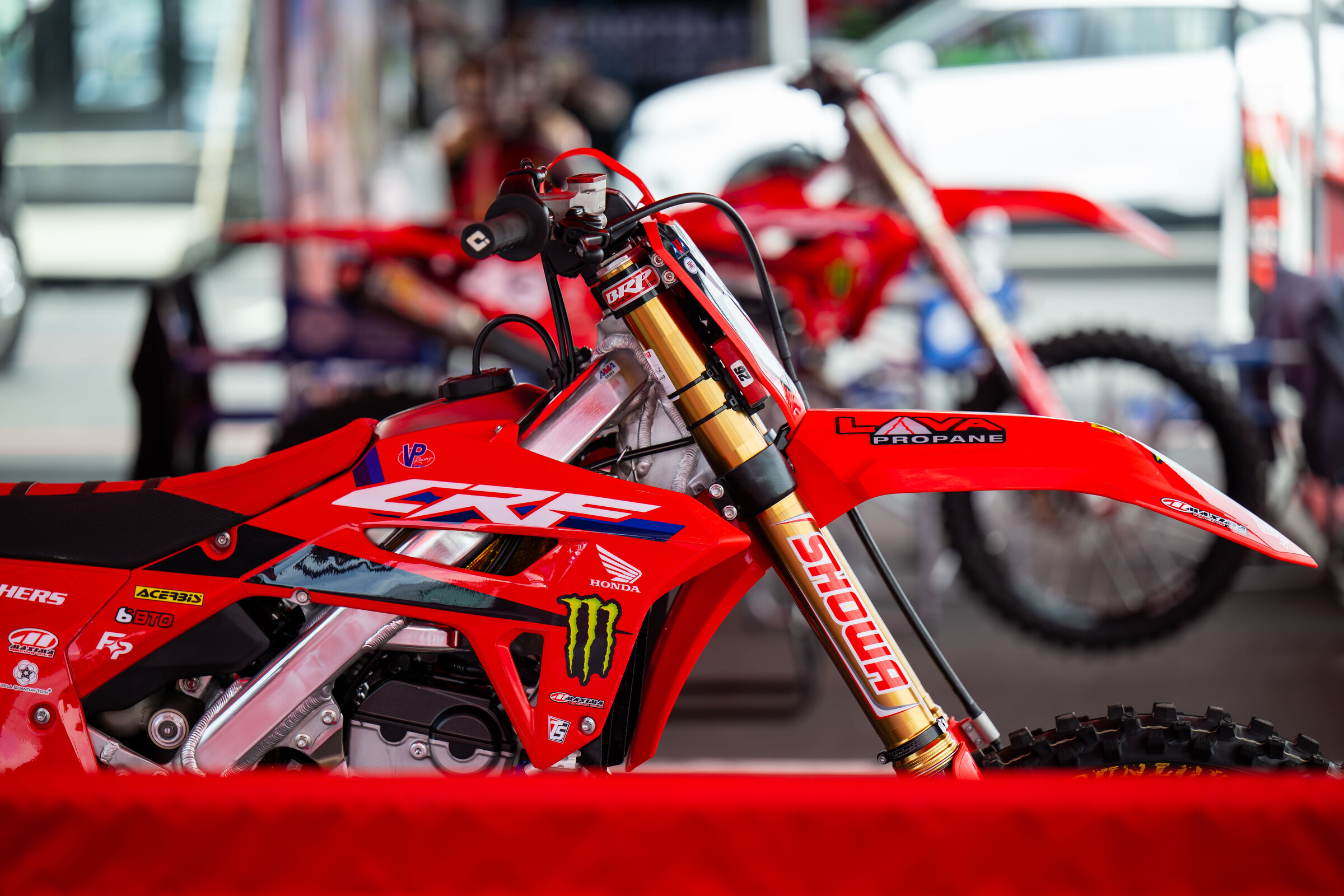 Parker's CRF250R under the SLR Honda team tent.