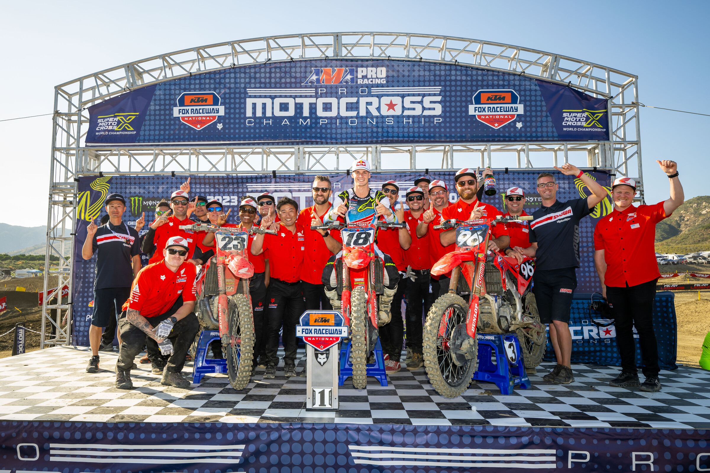 The Honda HRC crew celebrating their weekend.