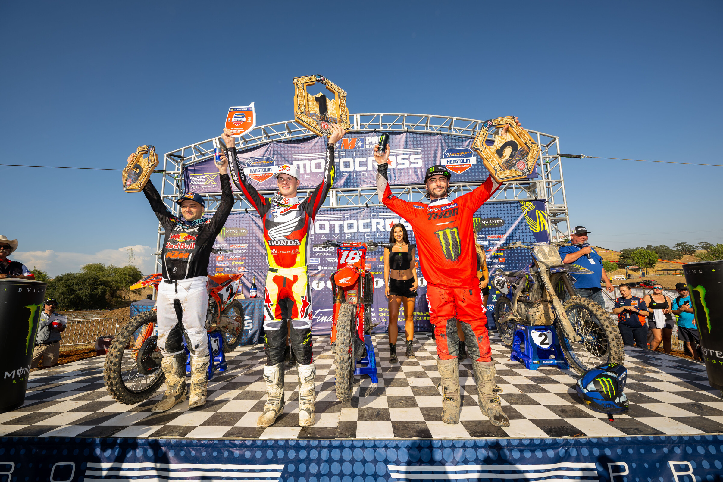 The 2023 Hangtown Motocross Classic 450 Class overall podium: Jett Lawrence, Cooper Webb, and Dylan Ferrandis.