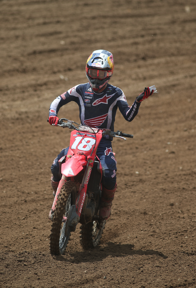Jett Lawrence disposing of his tear offs after the first moto.