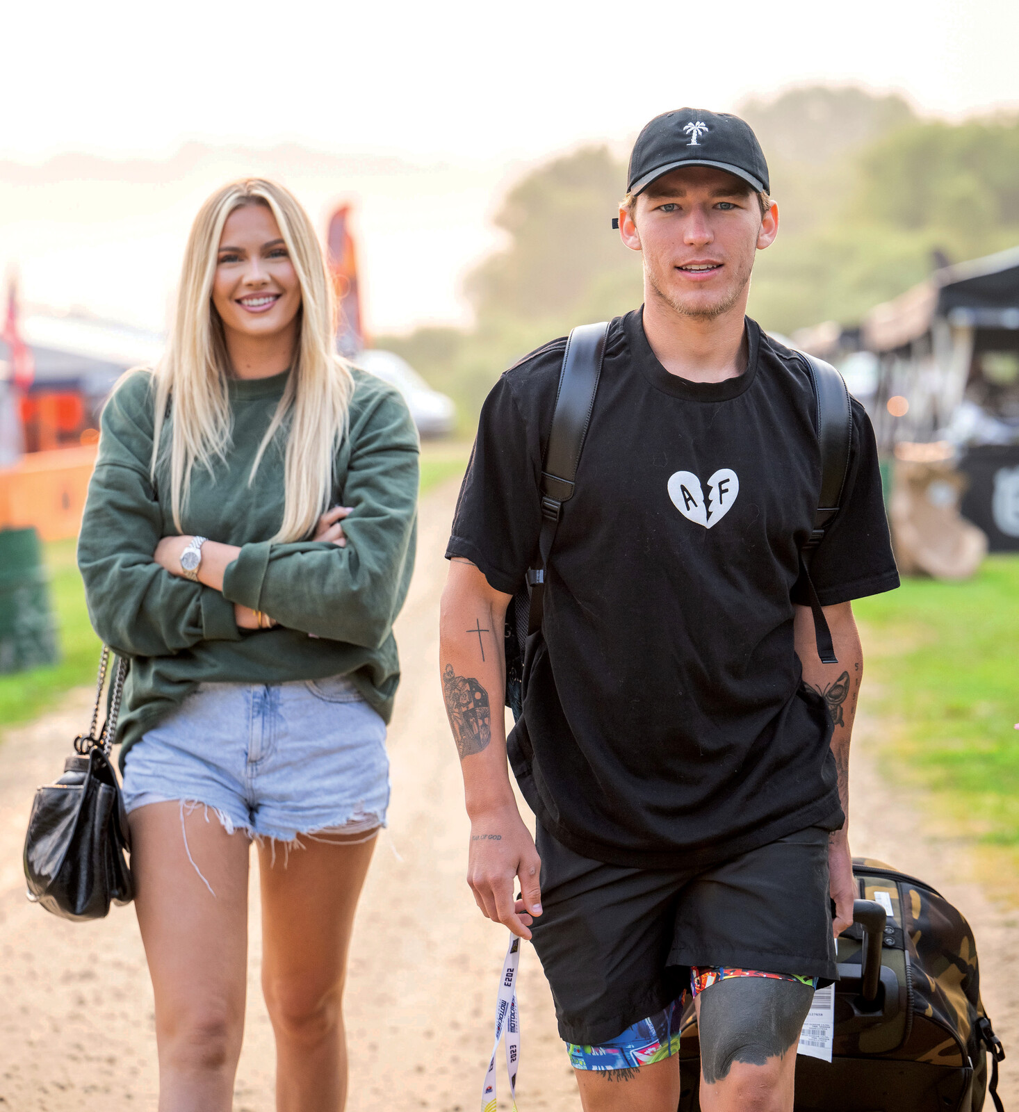 Austin Forkner and his girl Rylee make for a strong paddock entrance.