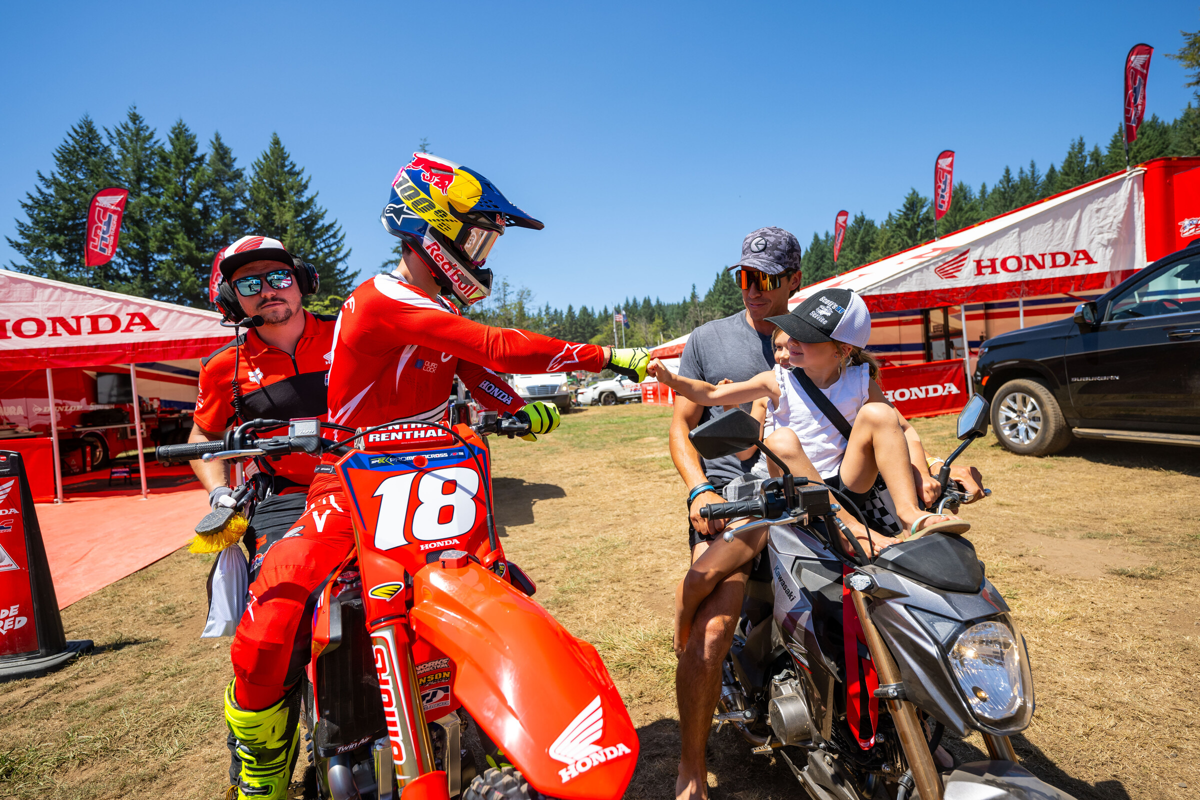 Jett Lawrence gives knuckles to some young fans at Washougal. Might have been fists of another kind once Phil came over to visit.