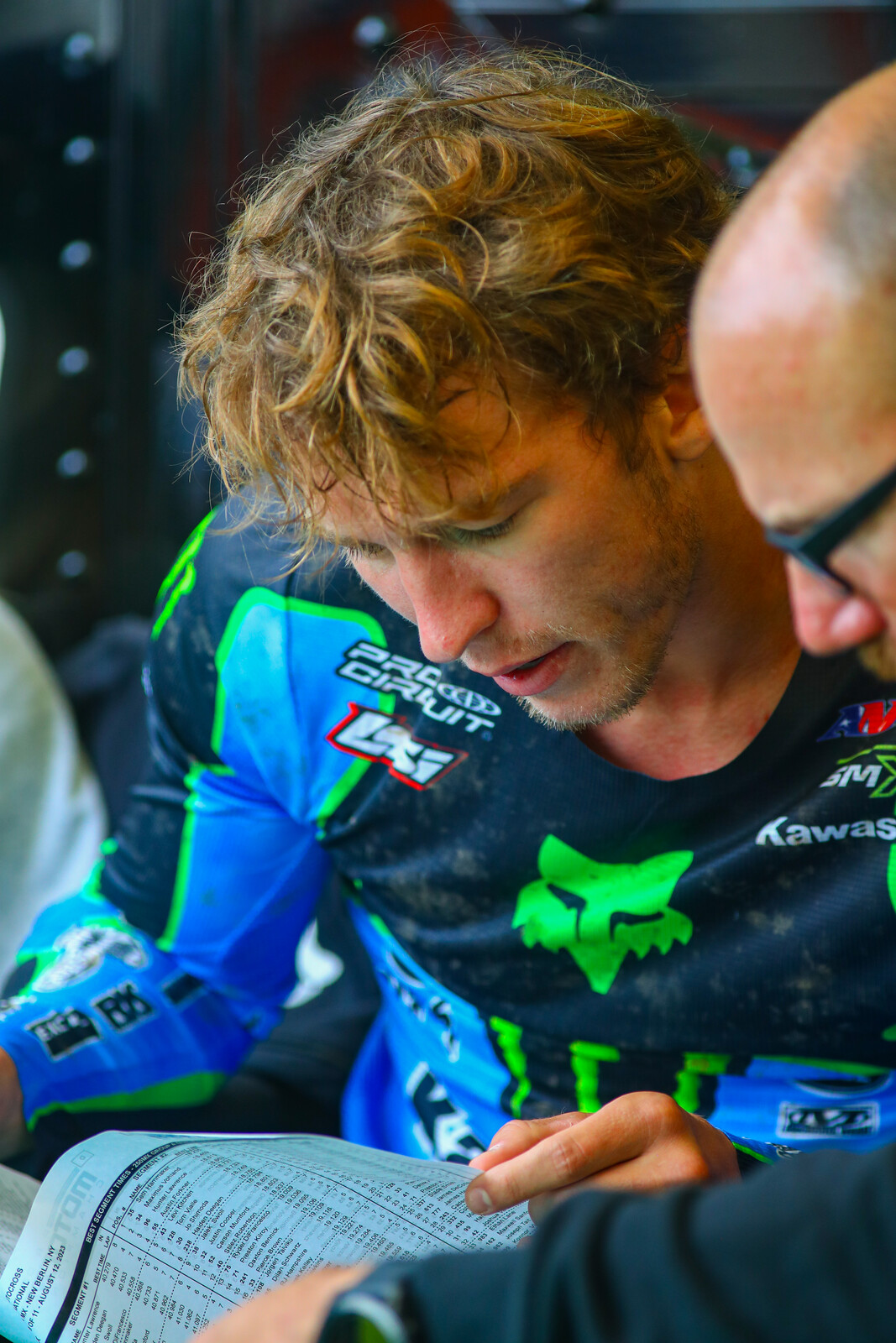 Forkner goes over lap times after the first qualifying session of the day.