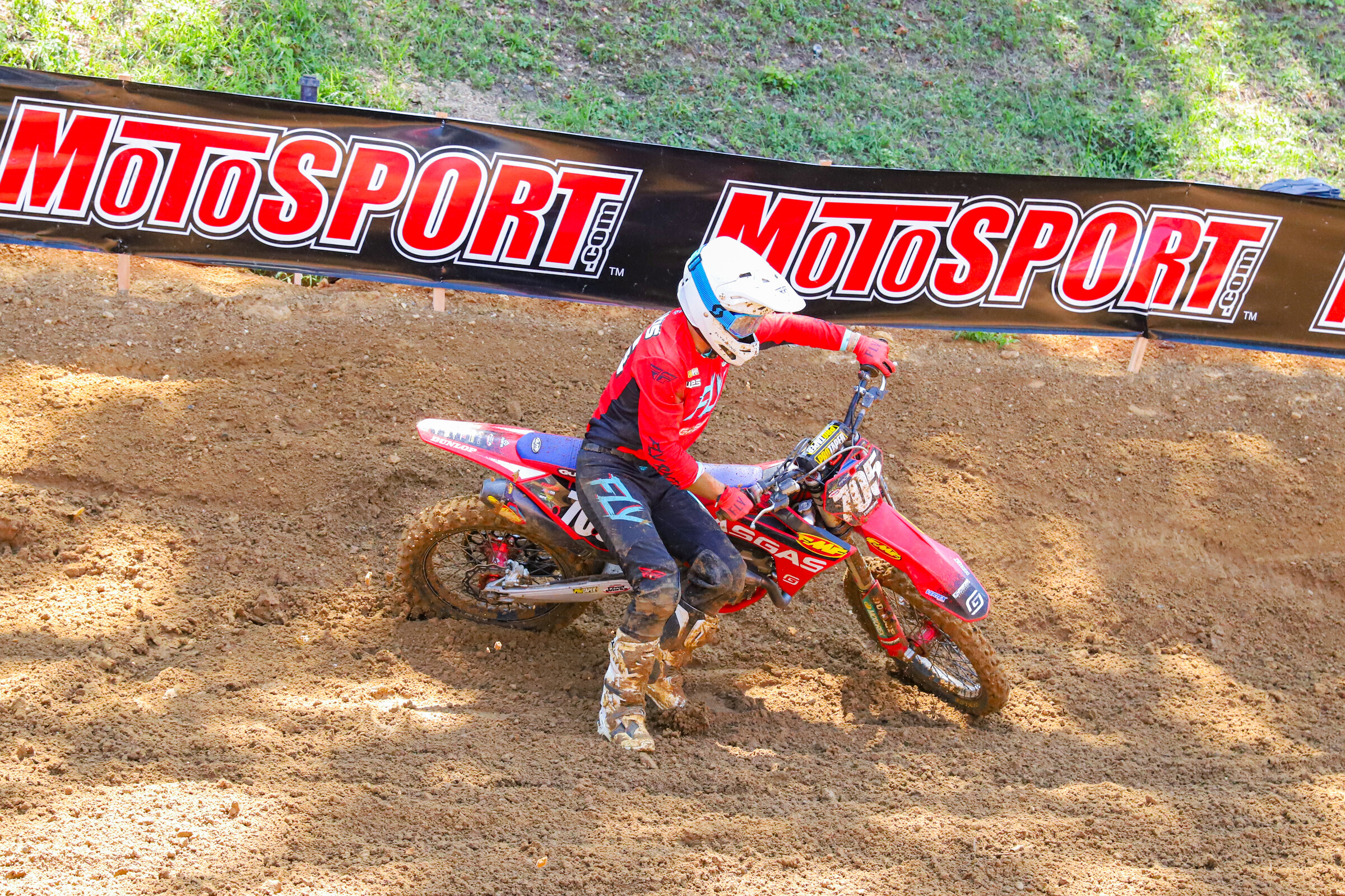 Mark Fineis down in the exit of the first turn in the first 250 Class moto.