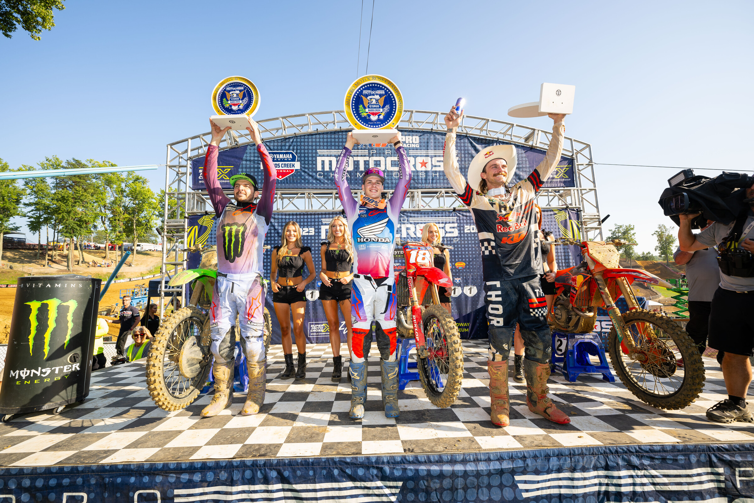 The 2023 Budds Creek National 450 Class overall podium: Jett Lawrence, Aaron Plessinger, and Jason Anderson.