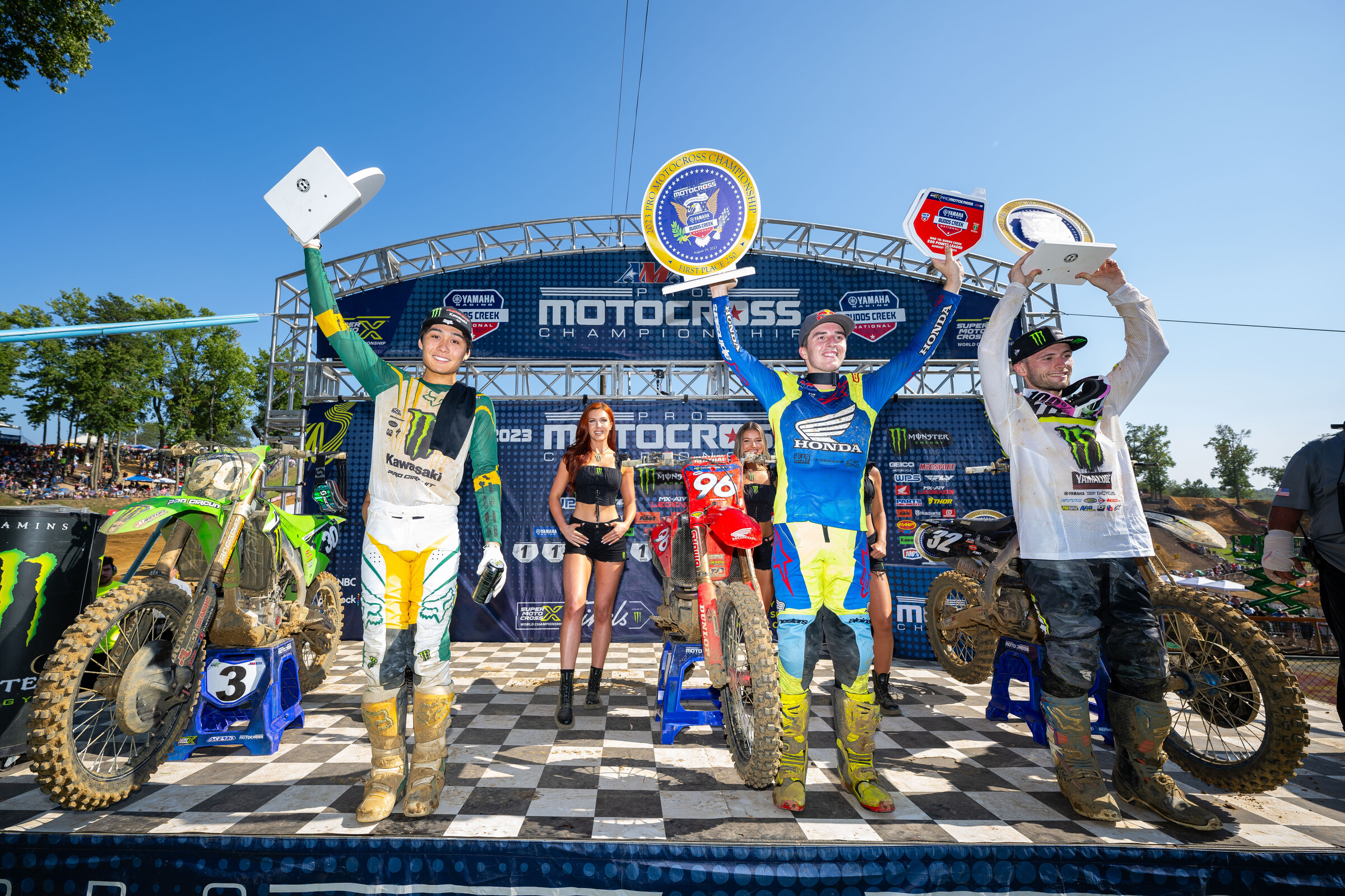 The 2023 Budds Creek National 250 Class overall podium: Hunter Lawrence, Justin Cooper, and Jo Shimoda.