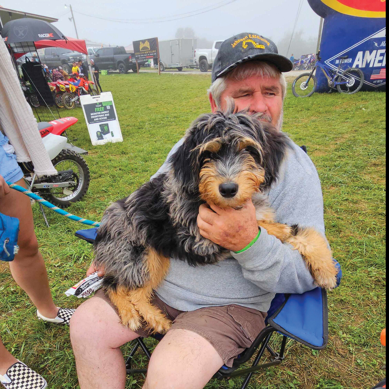 That’s Jim Vicheck somewhere behind his pup Cooper.