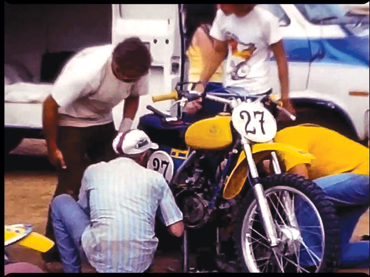 125 US Wally working on Marty's bike at World Cup