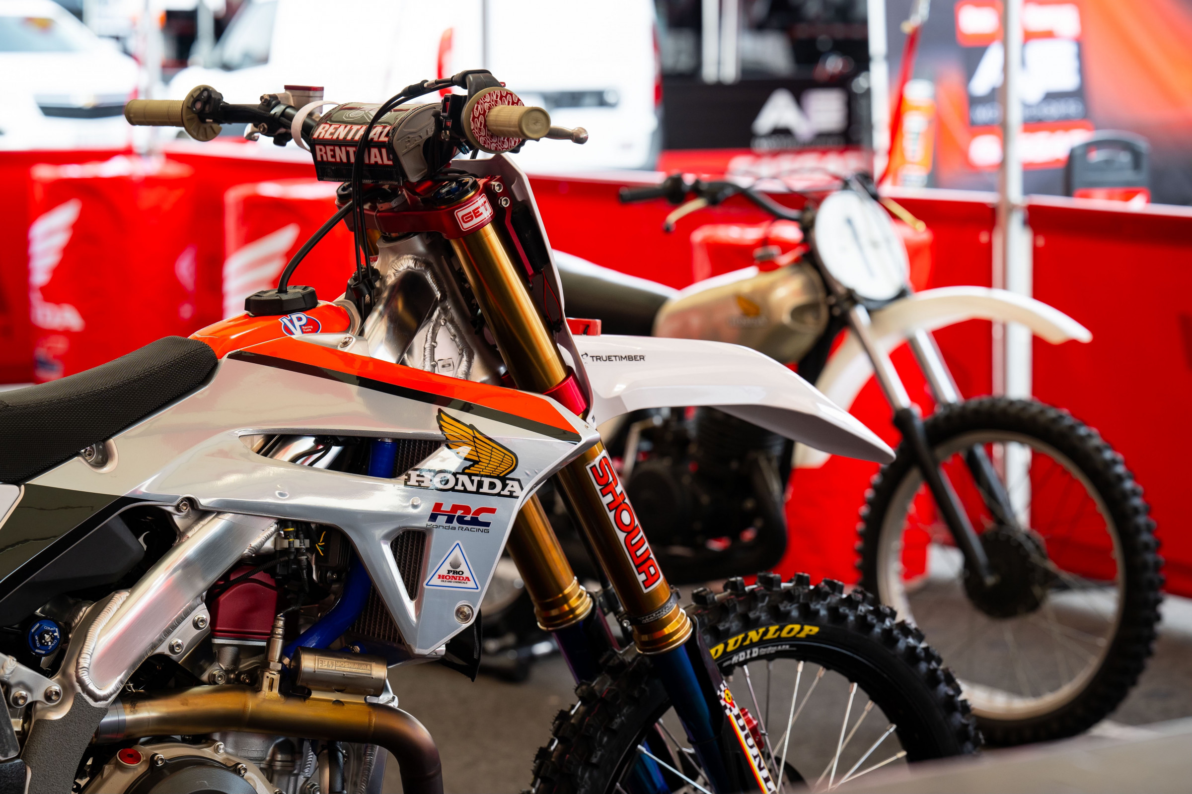 The current Honda HRC CRF450Rs with the old school Honda Elsinore.