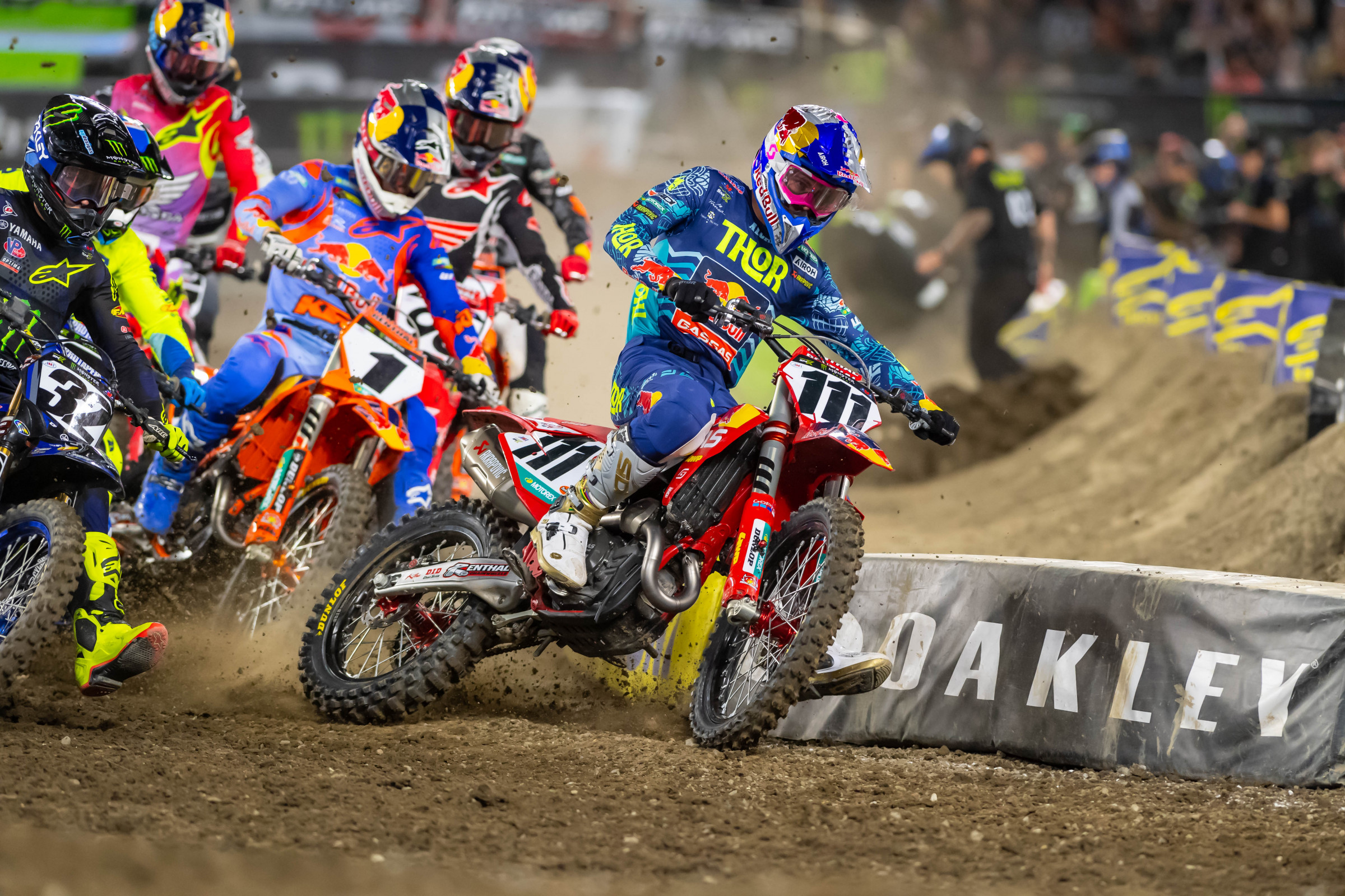 Jorge Prado (#111) got to the corner first but pushed wide and allowed Chase Sexton (#1) through.