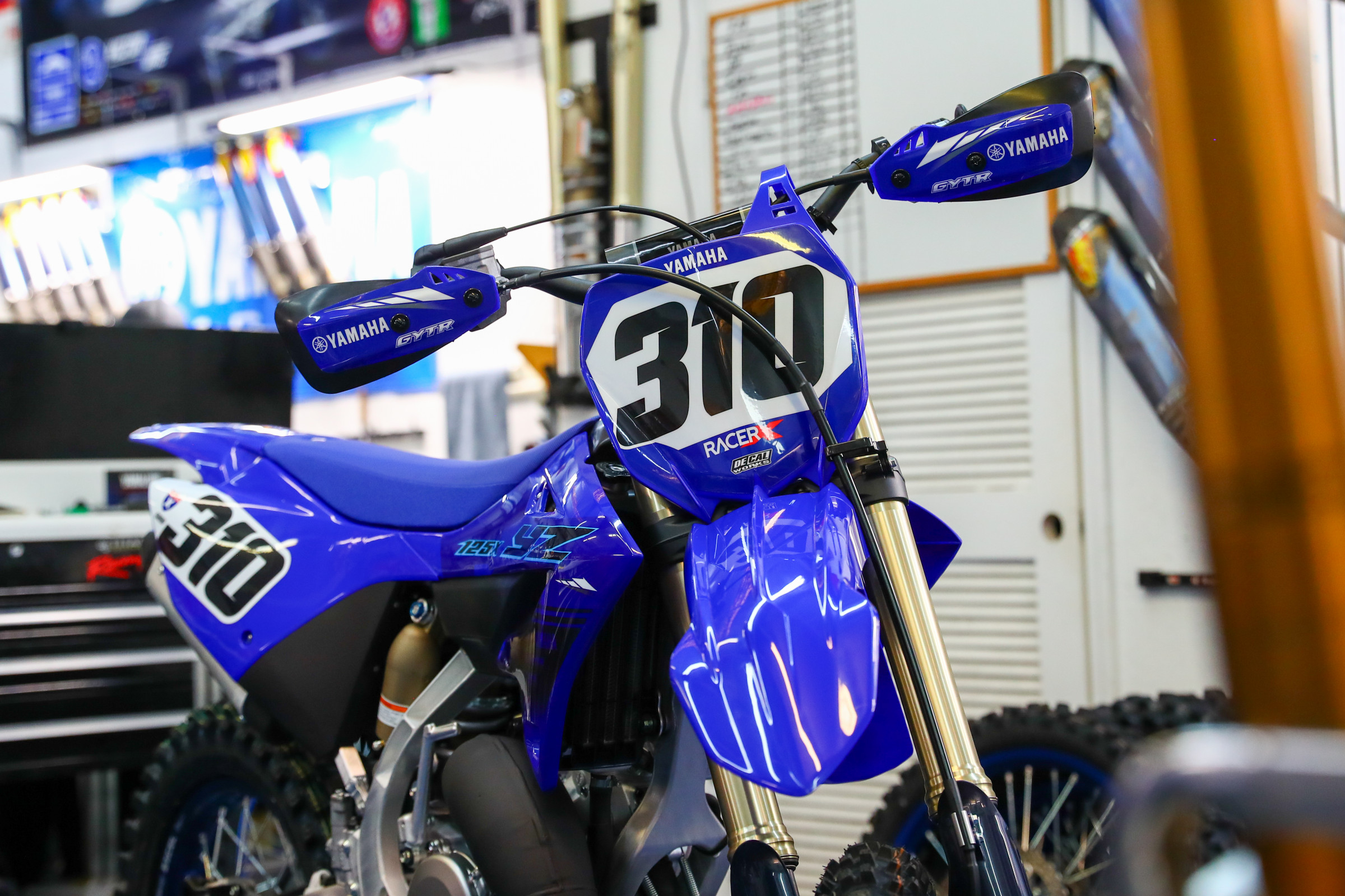 2024 Yamaha YZ125X in the AmPro Yamaha race shop.