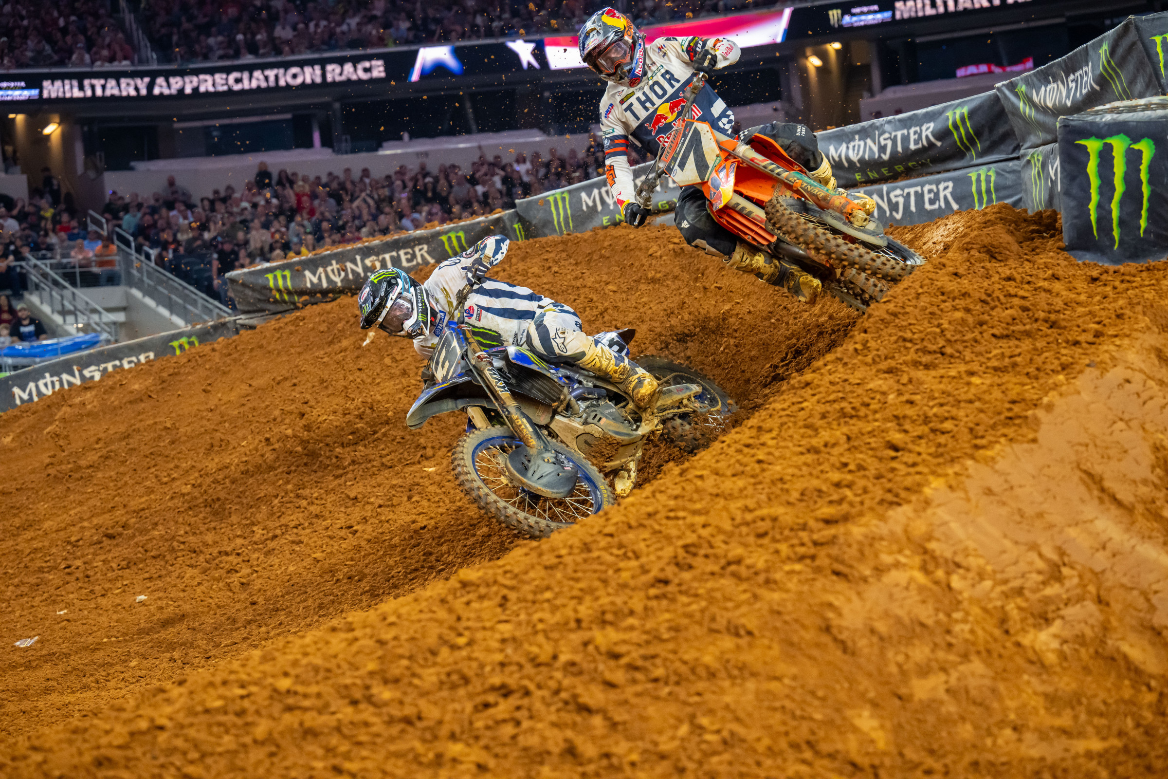 Eli Tomac passing Aaron Plessinger.