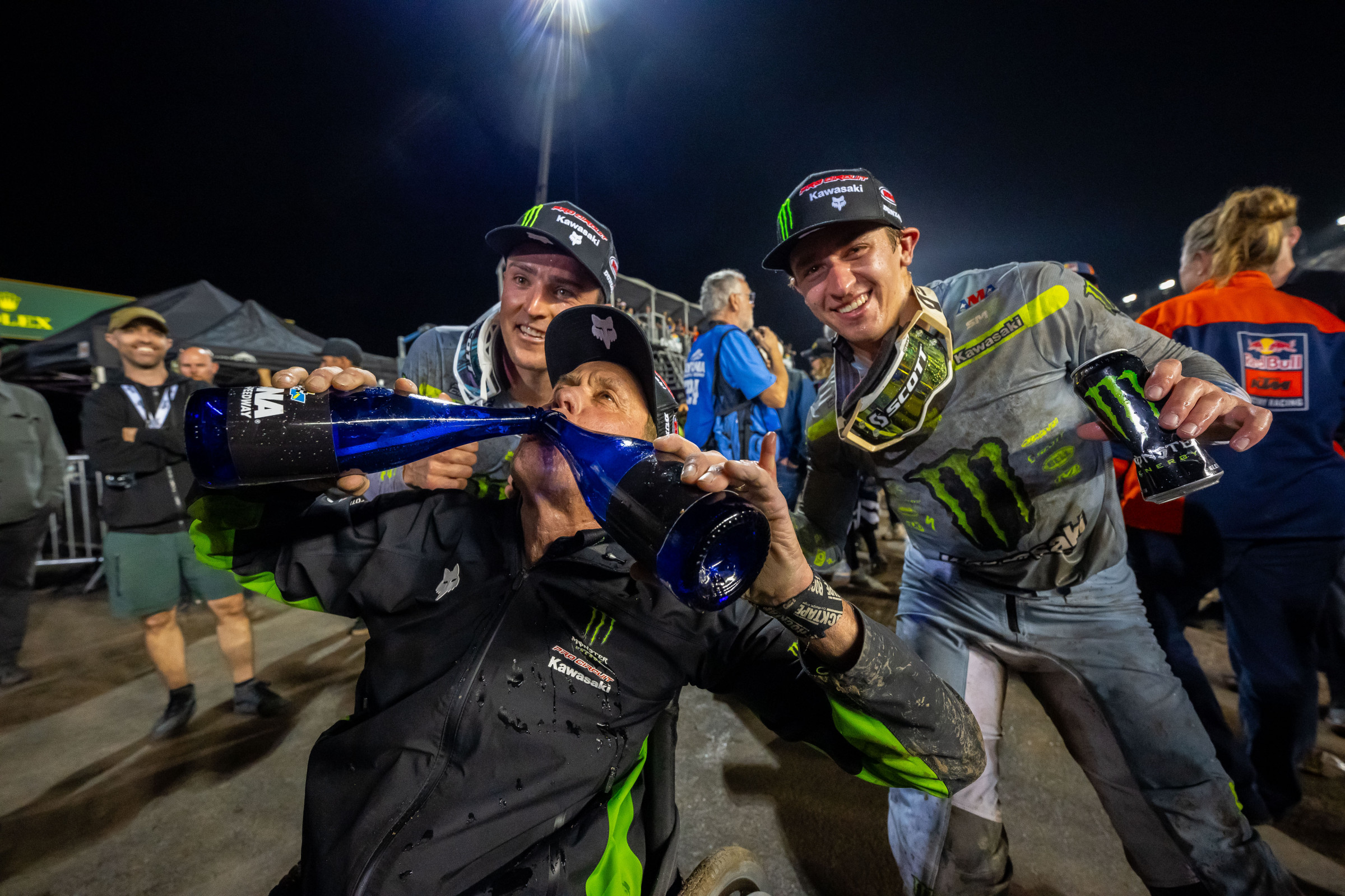 Mitch Payton celebrating McAdoo (left) and Hammaker (right) finishing on the podium together at the Daytona SX.