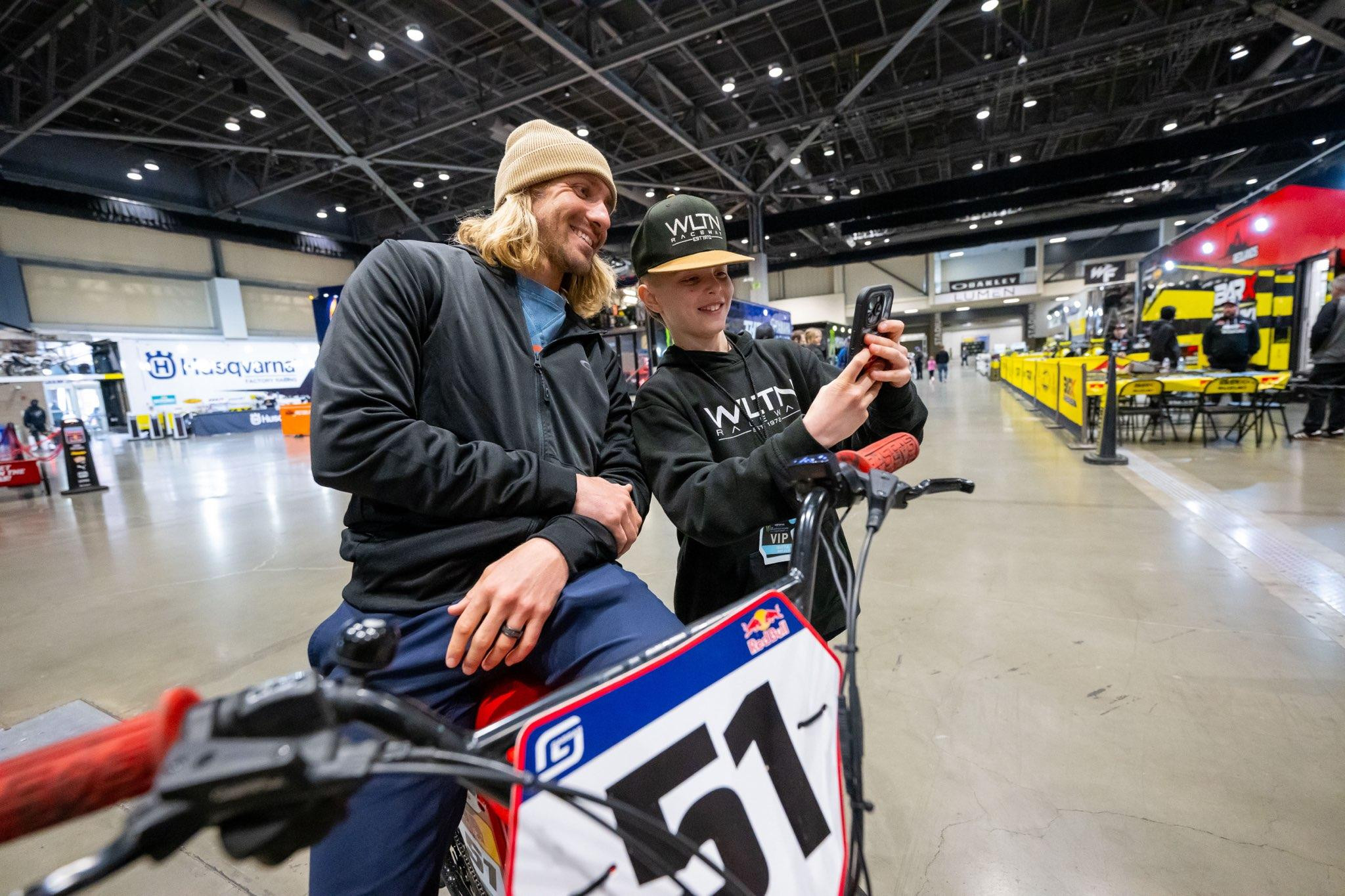 Justin Barcia making a fan's day in the paddock on Friday in Seattle.