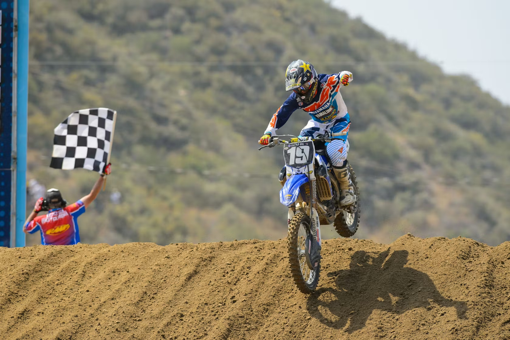 Jeremy Martin taking the checkered flag at the 2014 Glen Helen National, aboard the all-new Yamaha YZ250F.