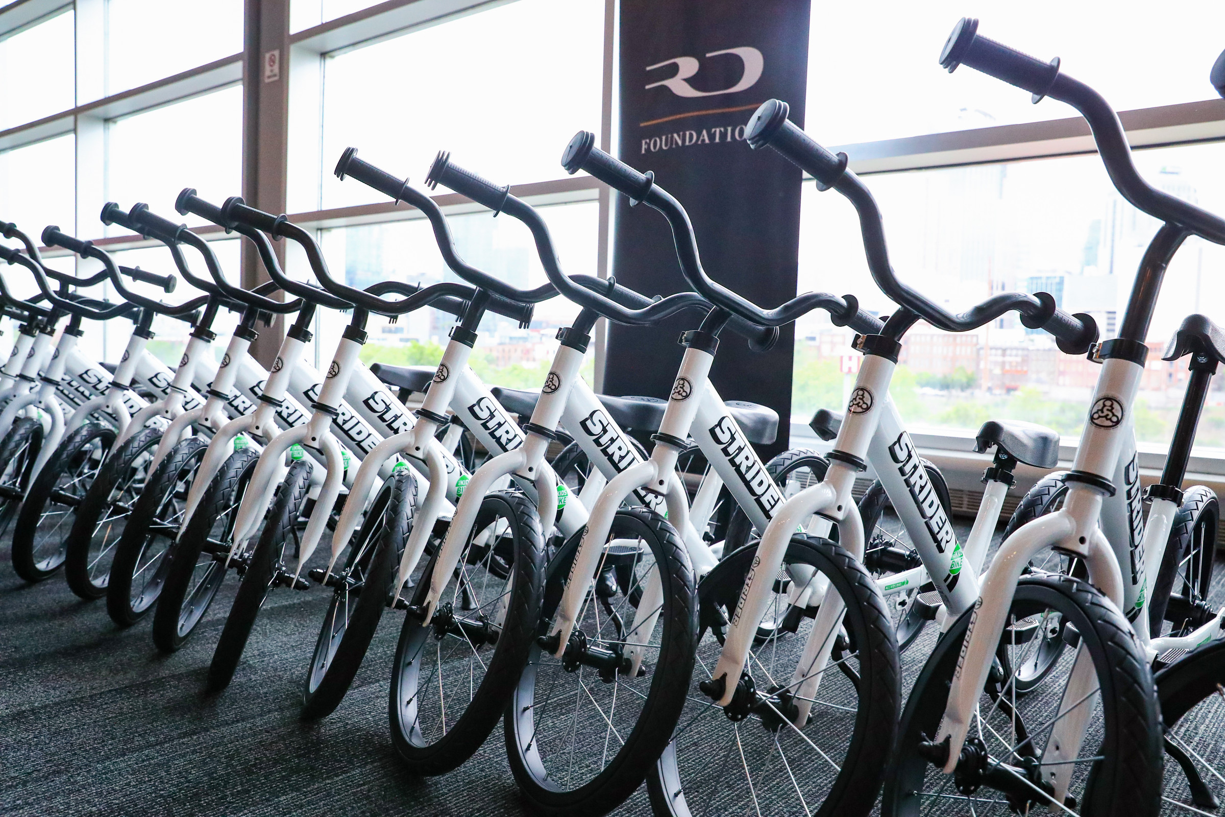 Members of the industry build over a dozen Strider bikes for Ryan Dungey's All Kids Bike program. Dungey and crew took the bike to local schools shortly after.