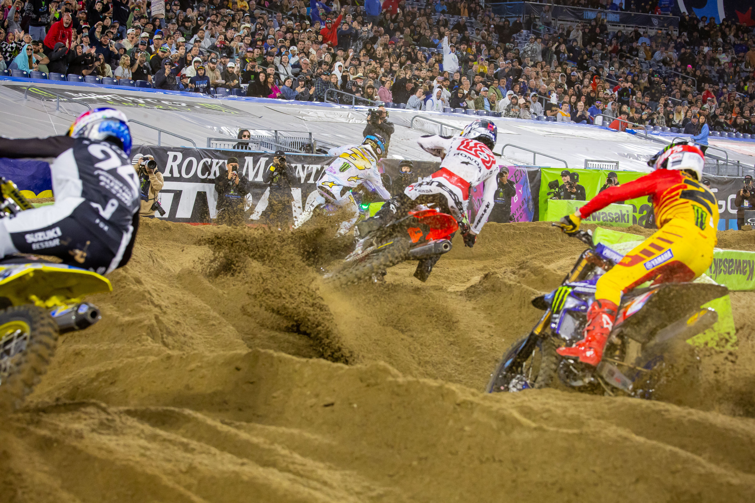 Tomac, Lawrence, Webb, and Roczen during the opening lap of the 450SX main event.