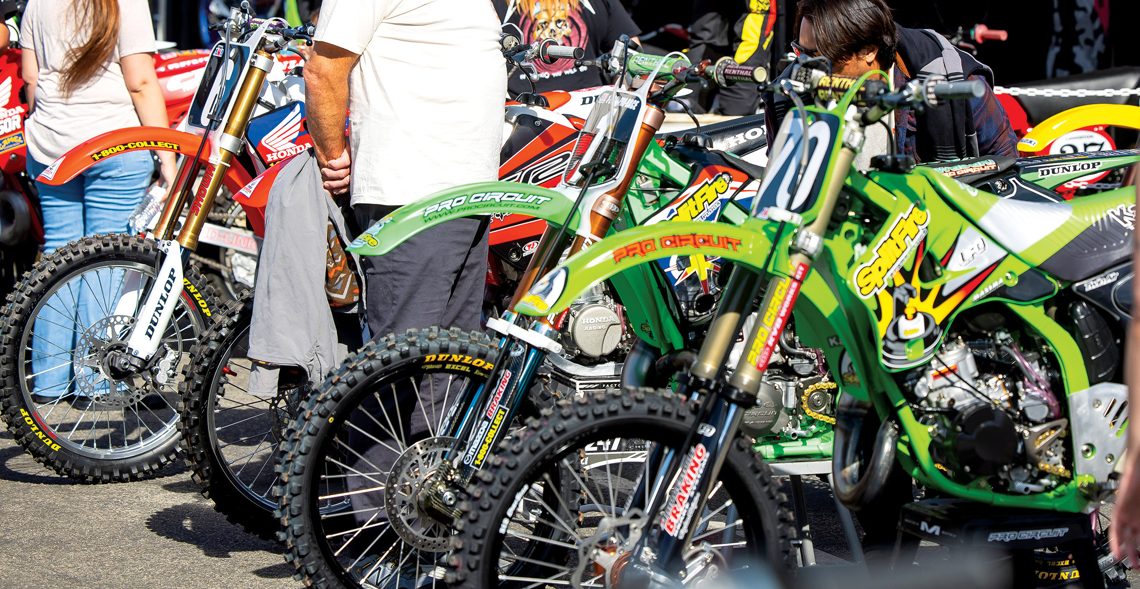 attendees admiring bikes
