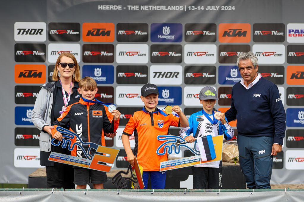 65cc FIM World Cup Podium with Infront Moto Racing MX Junior General Manager Patricia Maskarova (Left) and FIM CMS Director Antonio Alia Portela (Right)