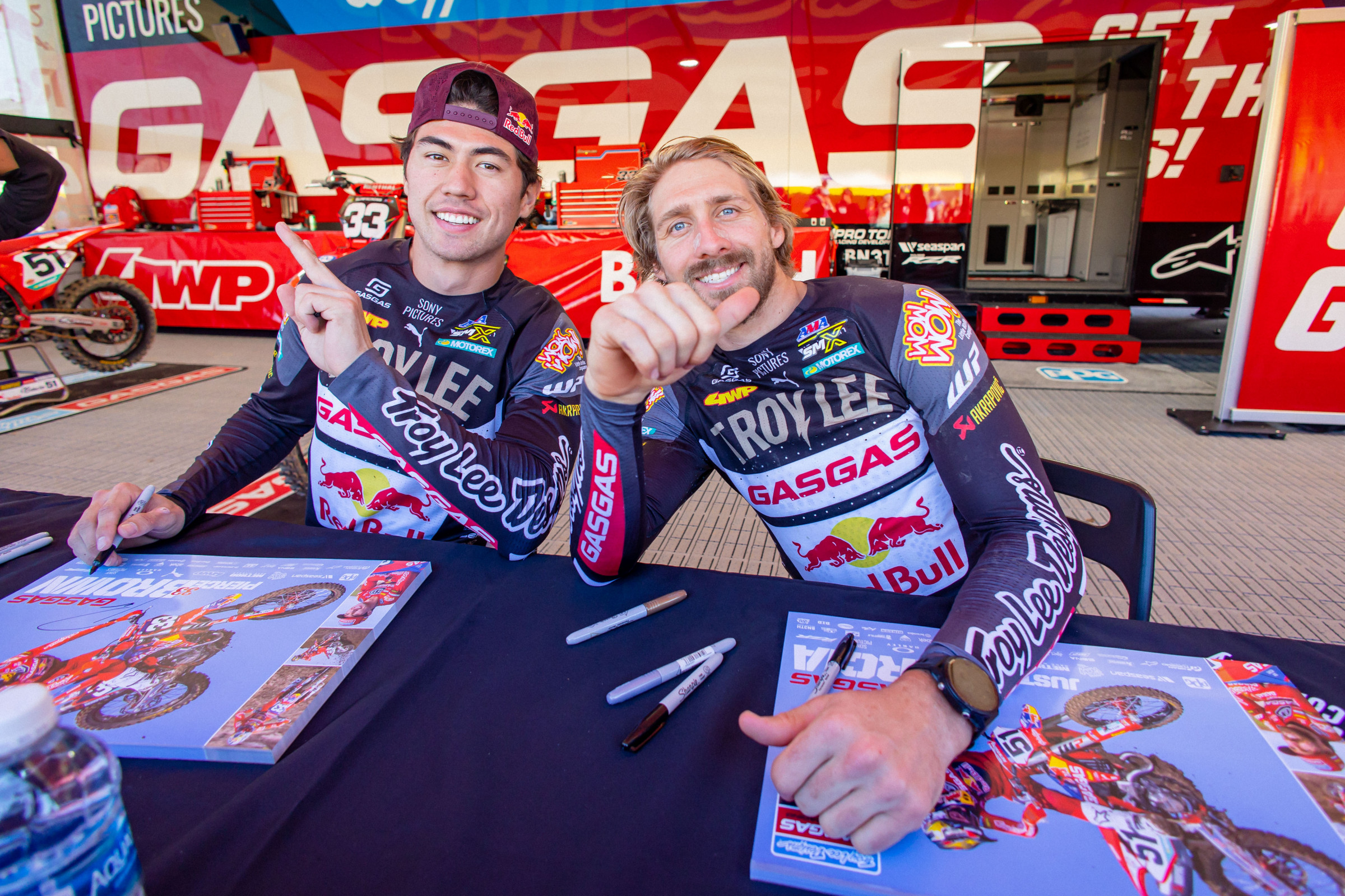 Justin Barcia and Pierce Brown at the Troy Lee Designs Red Bull GASGAS Team Rig where fans can experience unprecedented access to the team during an all-inclusive team experience.