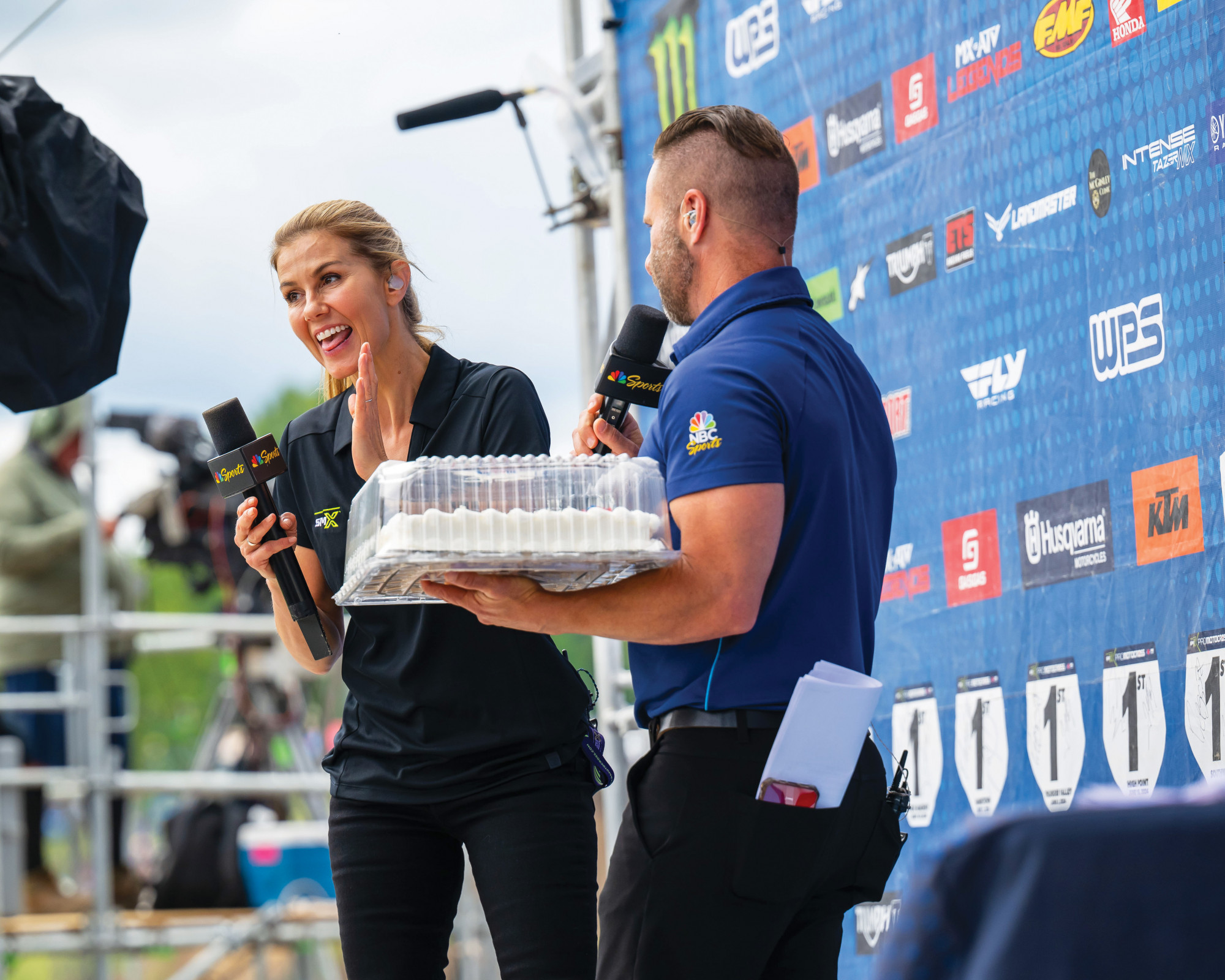 The TV crew surprised Will Christien at RedBud with a cake for becoming a U.S. citizen.