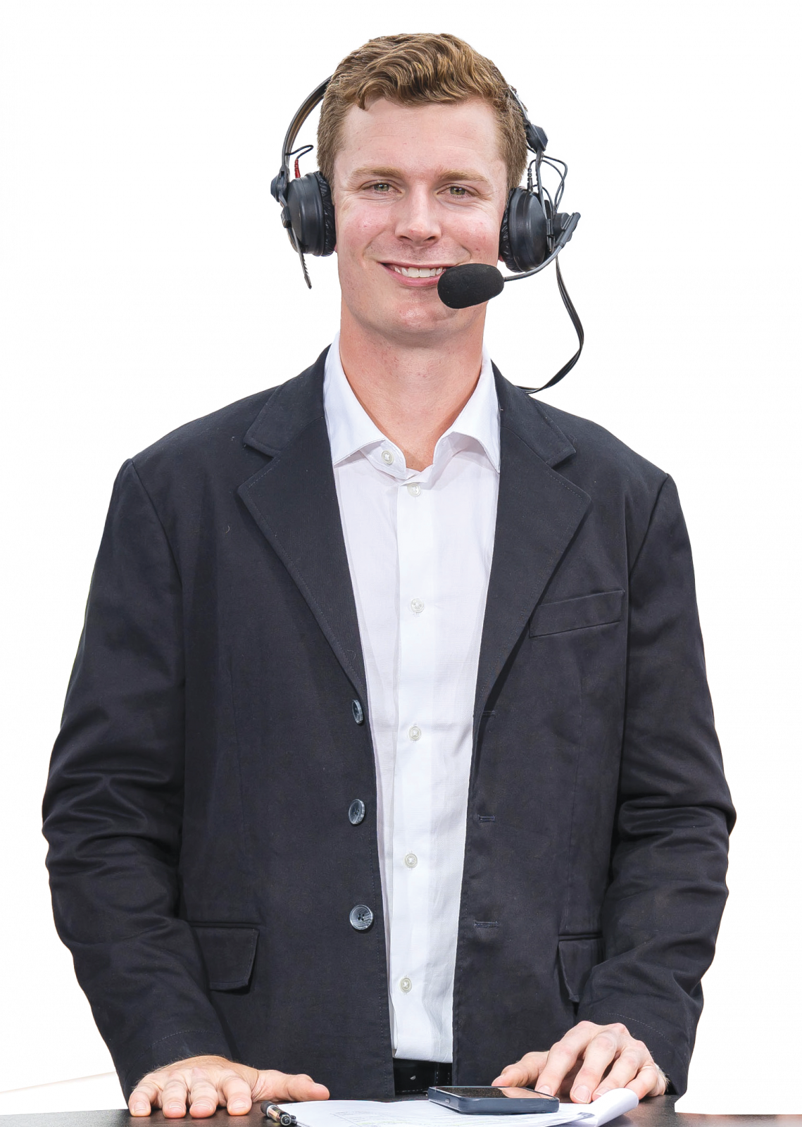 Adam Cianciarulo at desk wearing headset