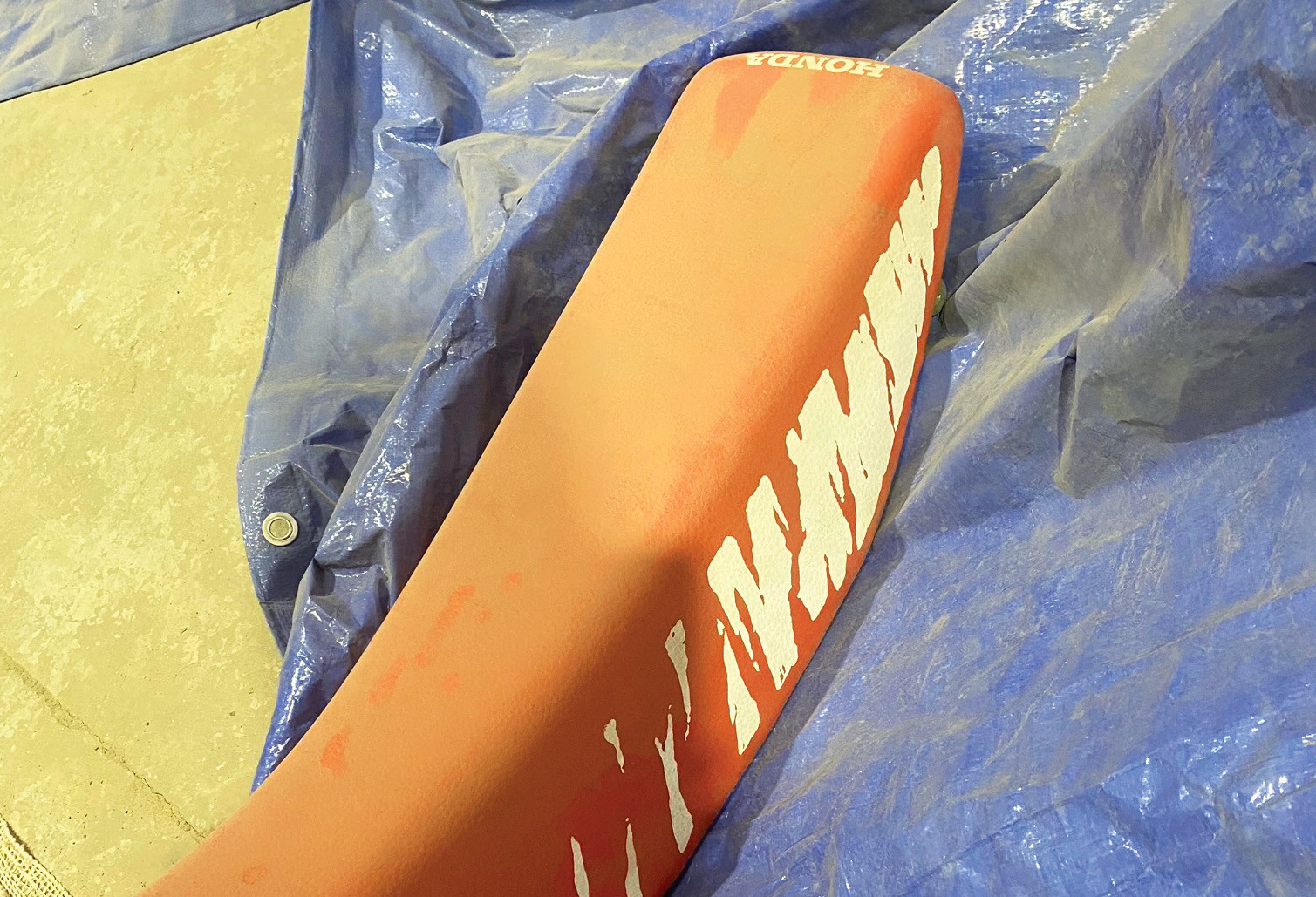A brand new seat from a 1987 or ’88 Honda CR250R.