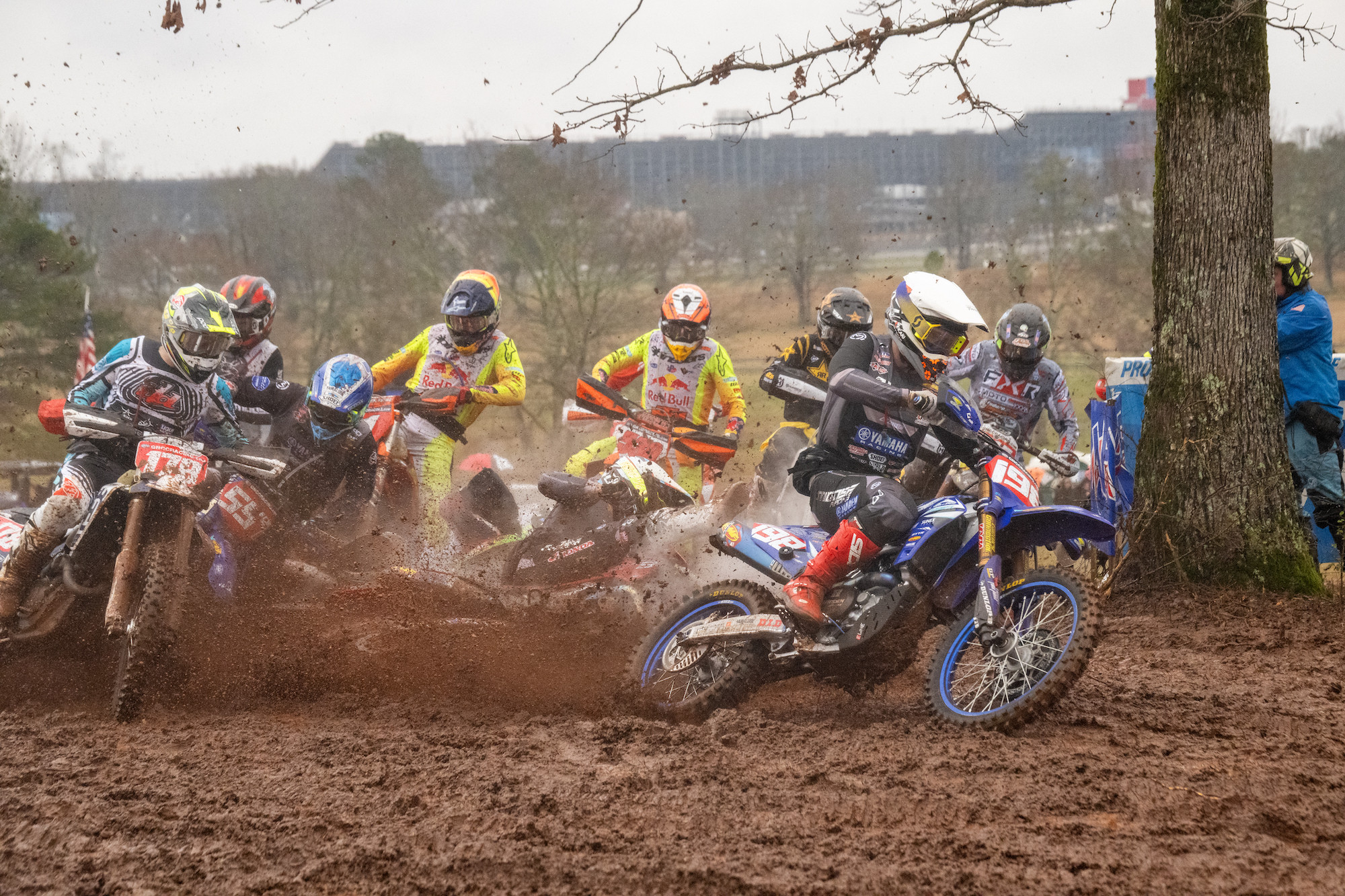 See the NASCAR track in the background? Talladega looked awesome but the weather forecast was not. Liam Draper took the holeshot and then the mud race began. That's Baylor going down and catching Kailub Russell (557), Mike Witkowski also got trapped.