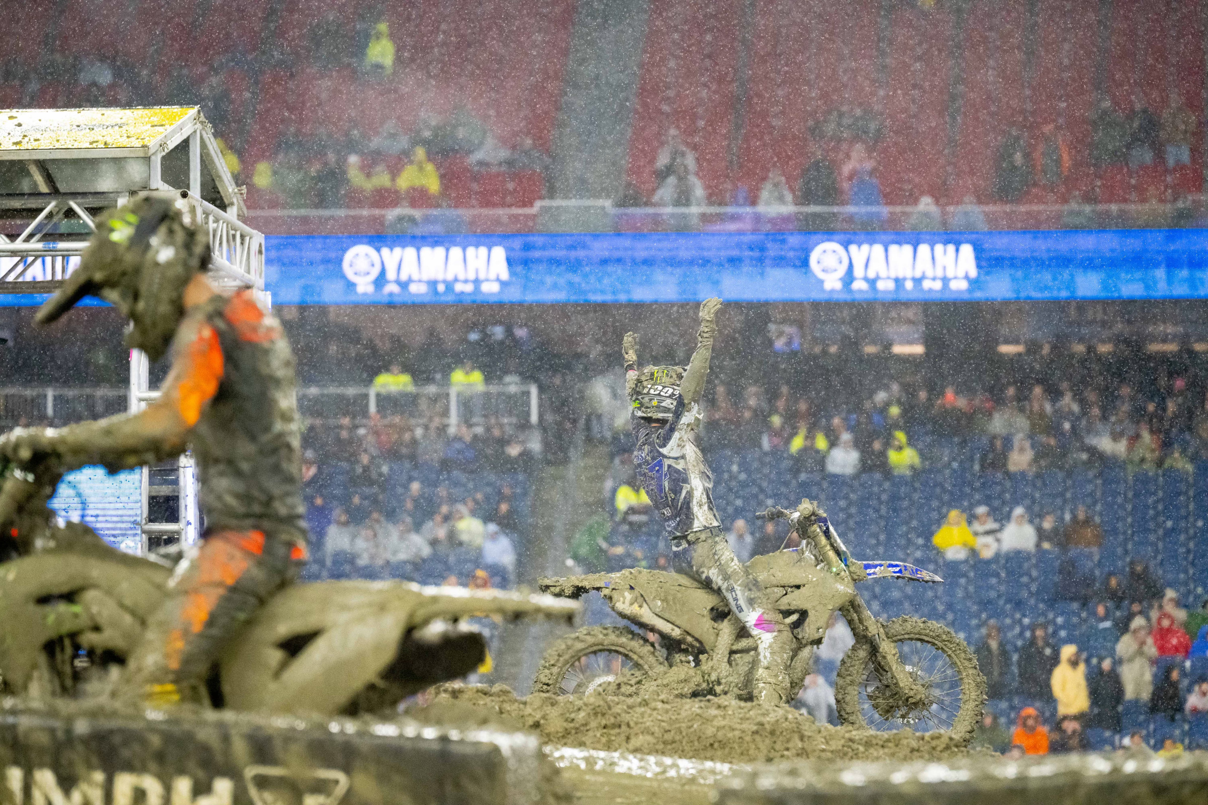 Kade Johnson celebrates after battling back to take theSMX Next - Supercross main event win.