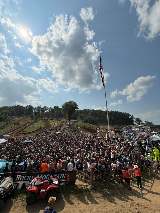 The podium was mobbed after Martin won the moto.