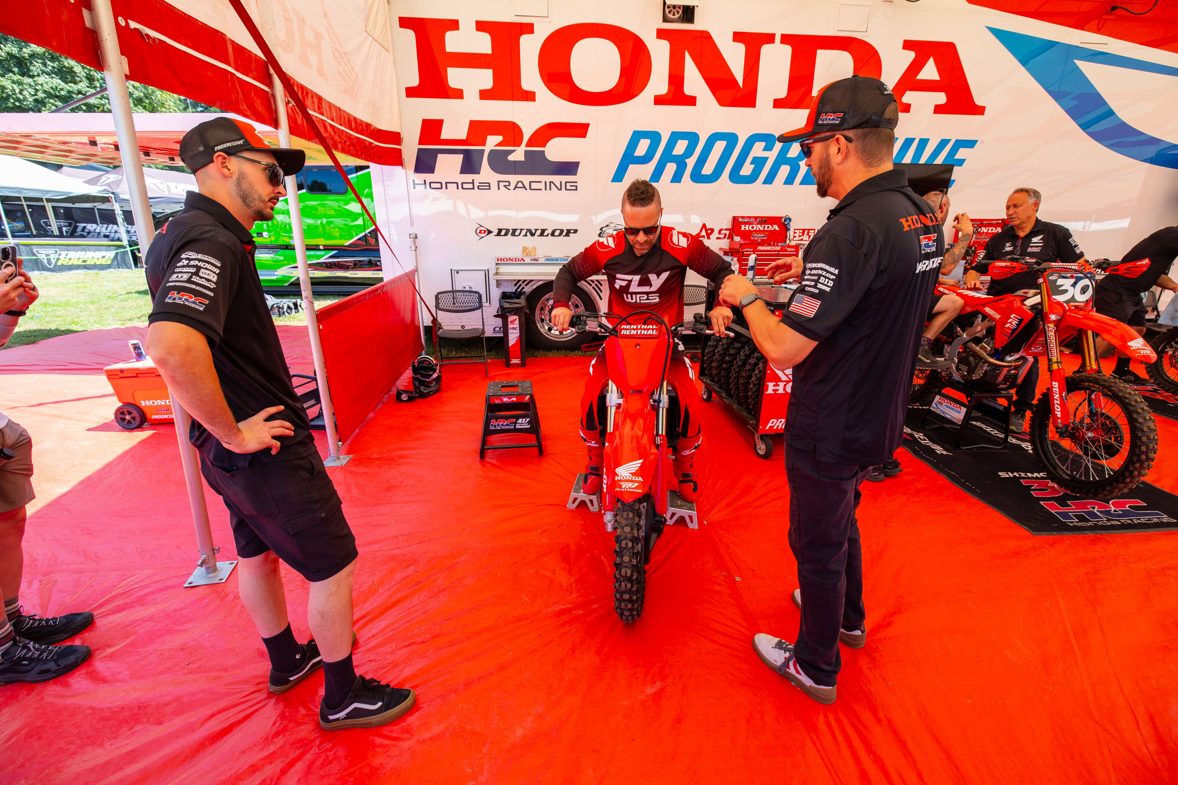 JT getting some intel from the  Honda HRC Progressive crew.