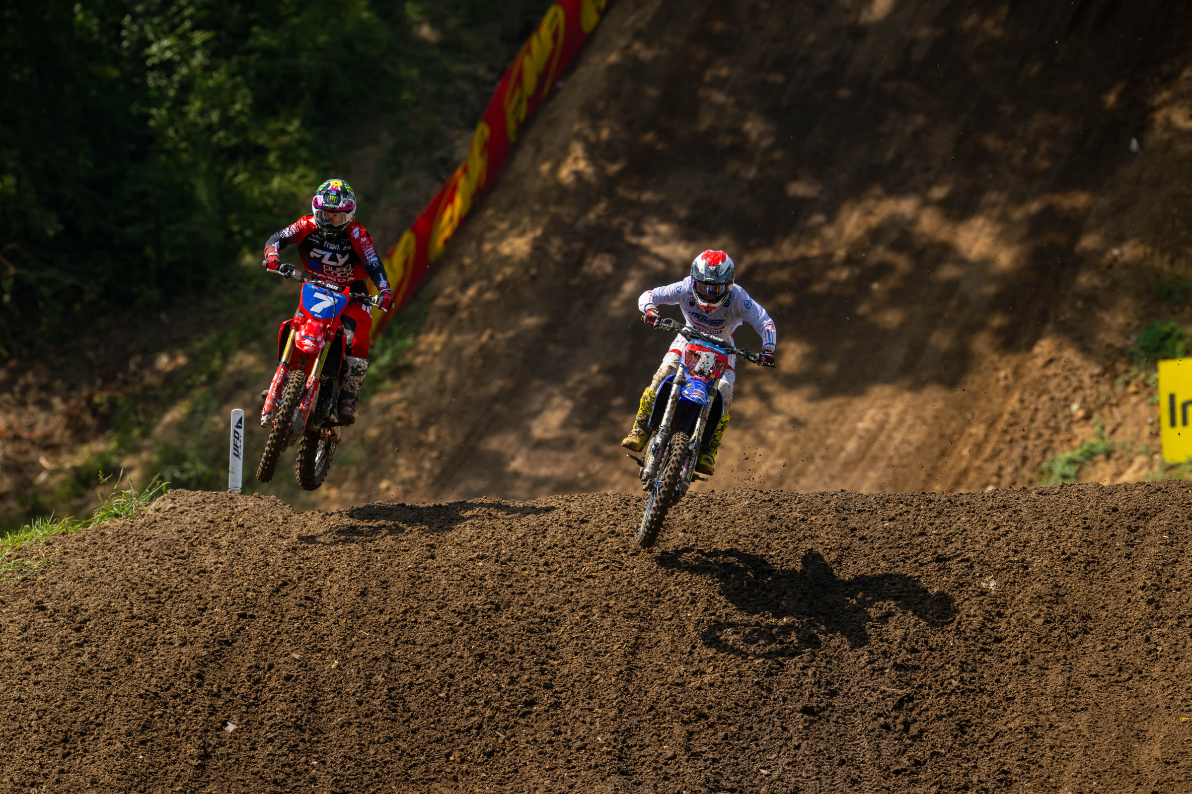 LaLa Turner (1) passes Charli Cannon (7) for the lead in moto two.