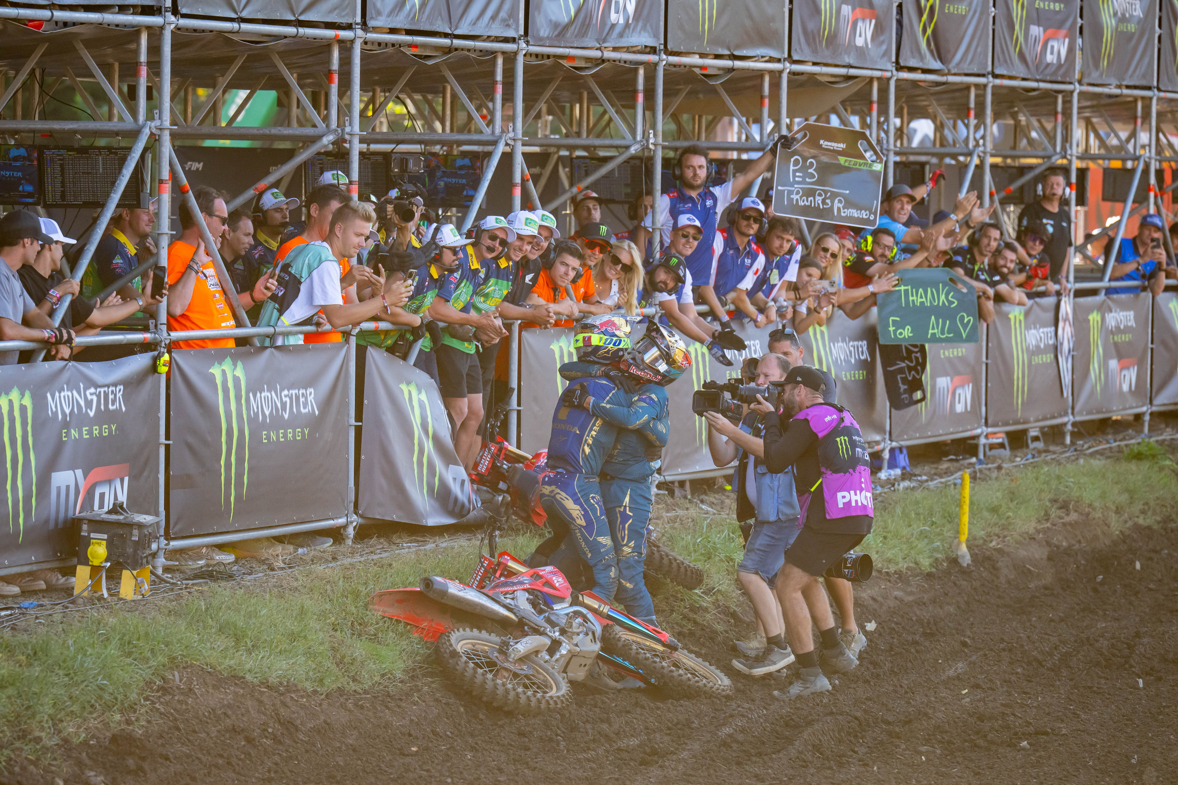 Jett (left) and Hunter Lawrence (right) hug after the third and final moto at Ironman Raceway, stamping the Aussie team's second straight MXoN win.