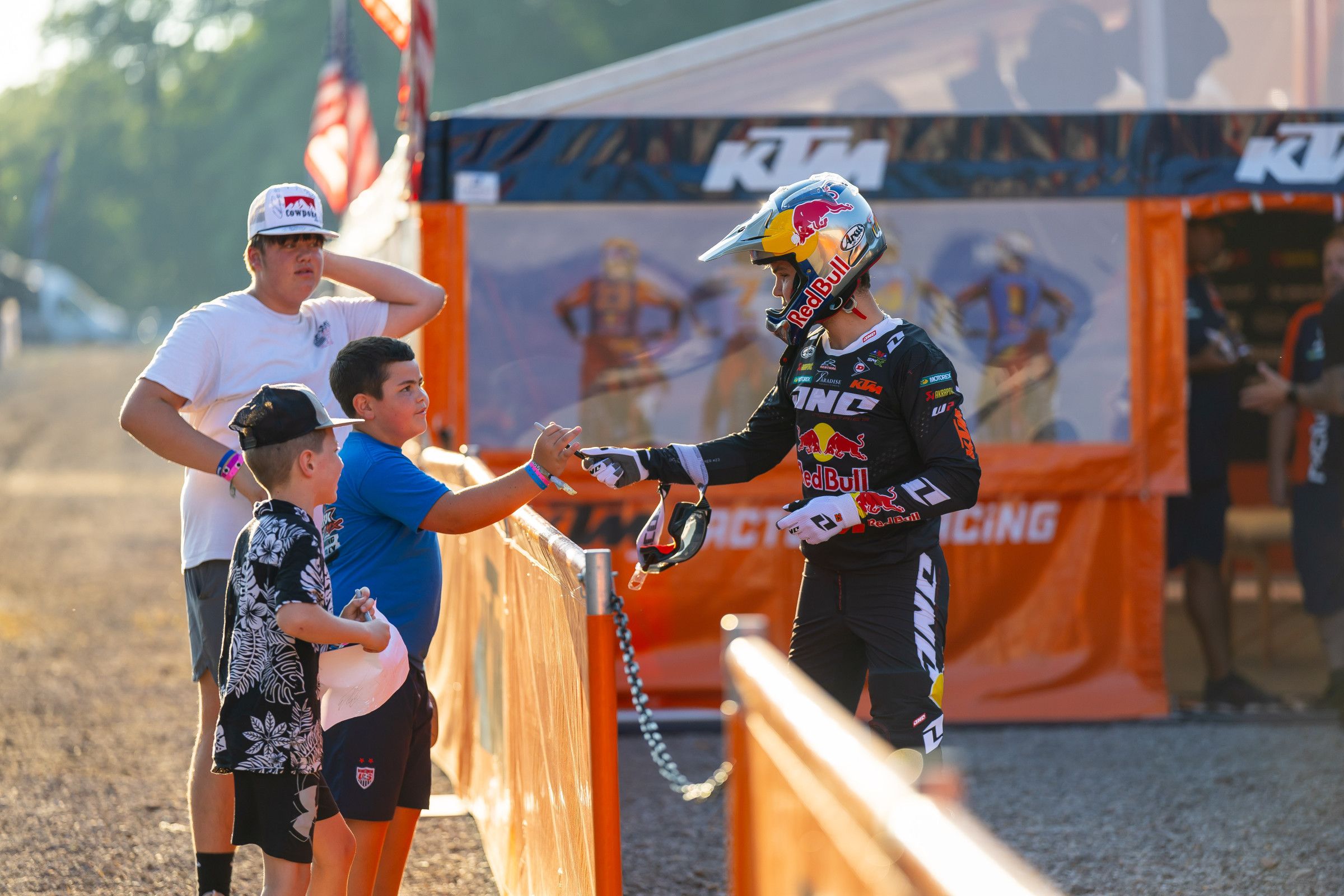 Julien Beaumer gives time to some kids on a Pro Motocross race day.