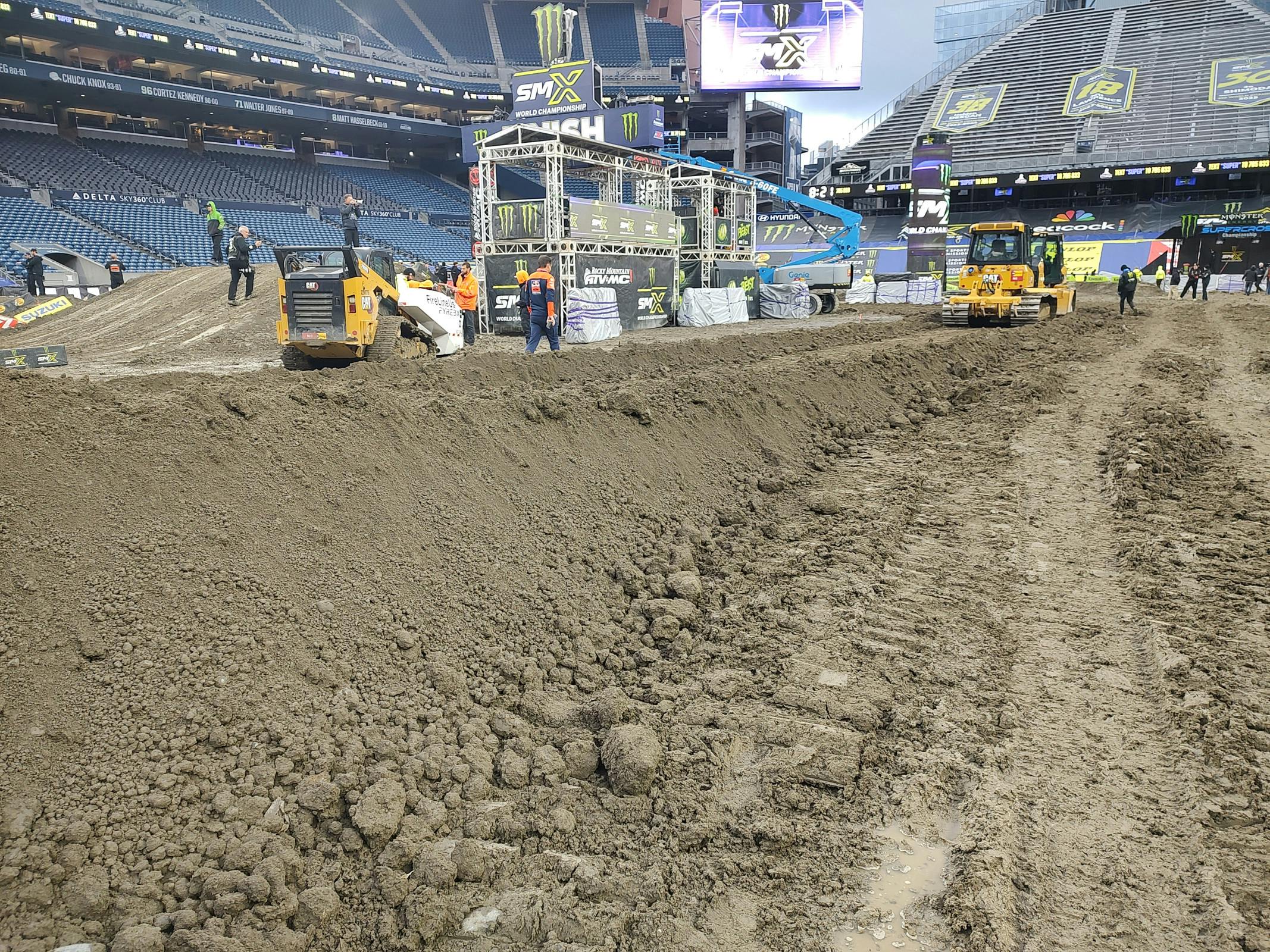 The track crew has mixed in generous quantities of dry dirt to the low spots that needed it most