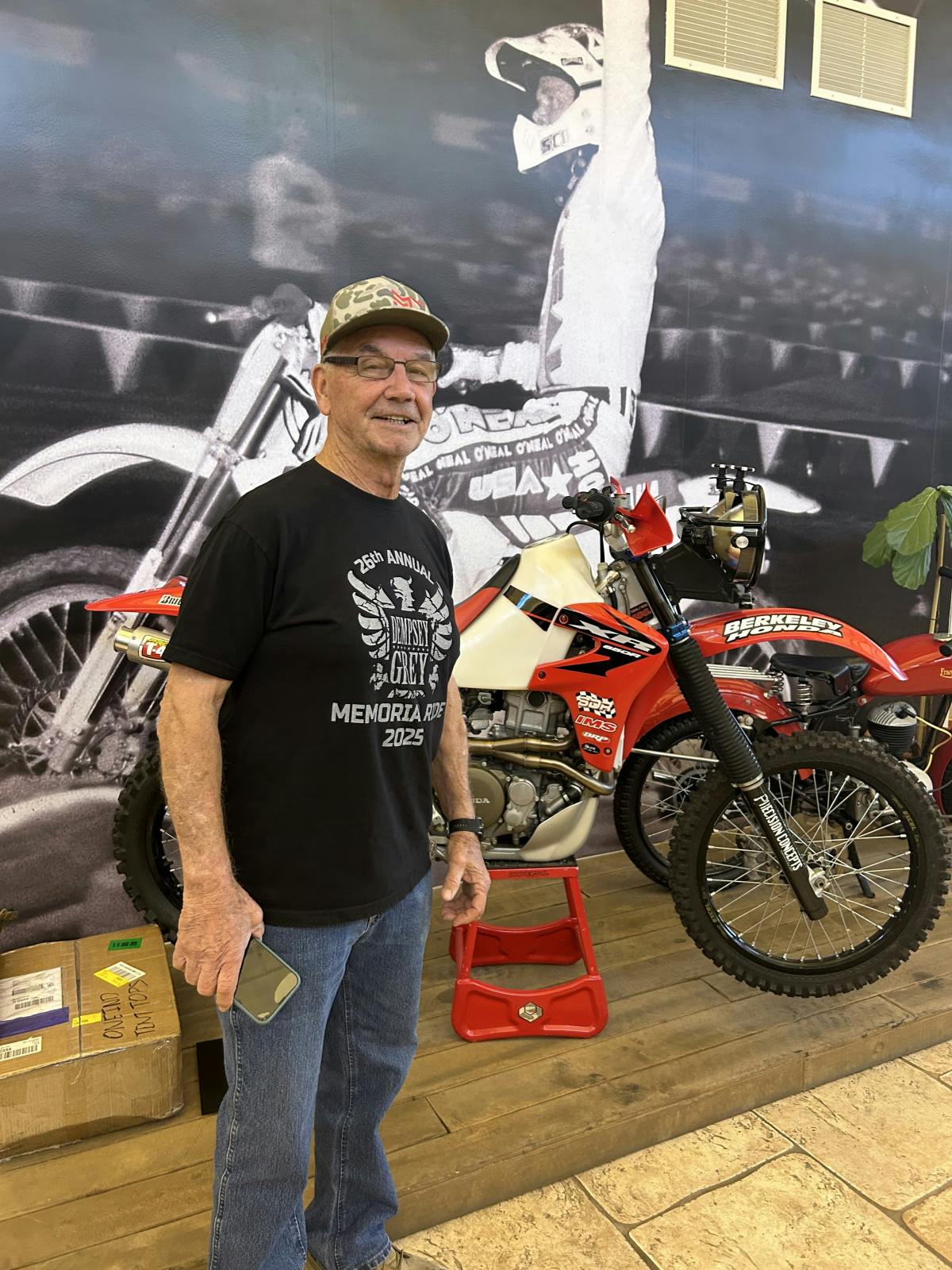 Jim O&rsquo;Neal founder of O&rsquo;Neal motocross gear posing with his famous Baja bike.