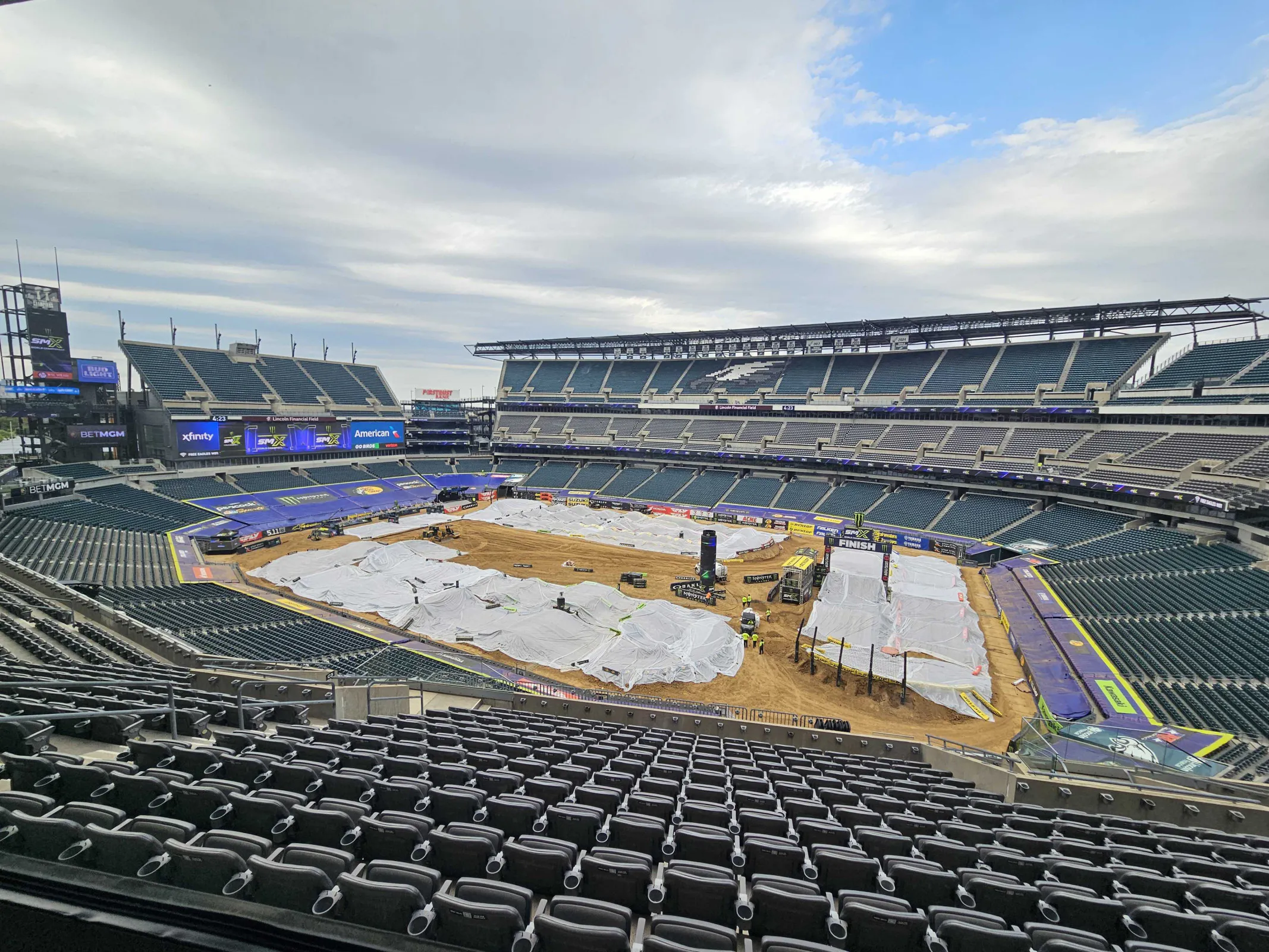 By 5 p.m. on Friday, the track was rolled in and covered with tarps for any overnight/early morning rain.