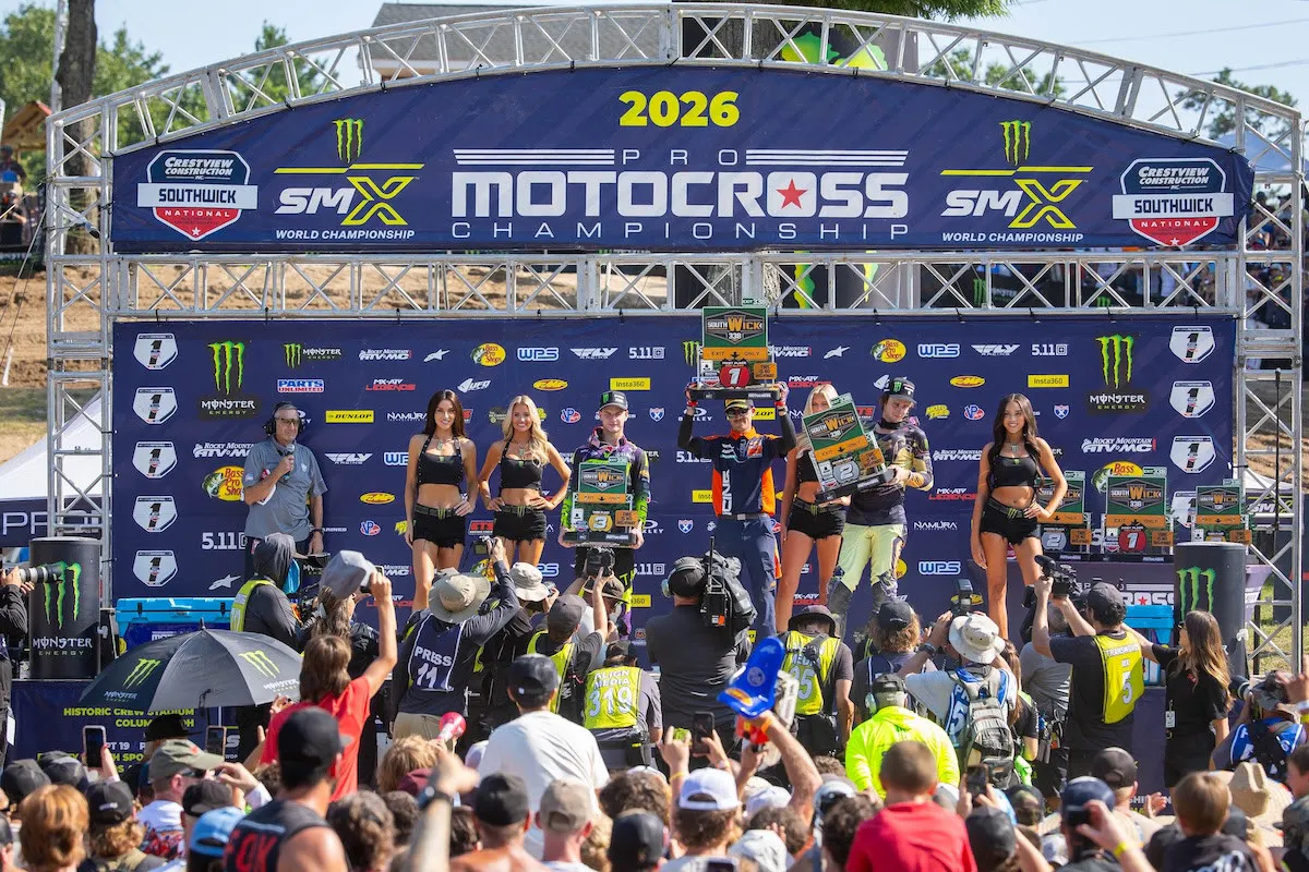 The 250 podium. With Sacha Coenen injured, his mechanic had to hold the trophy!